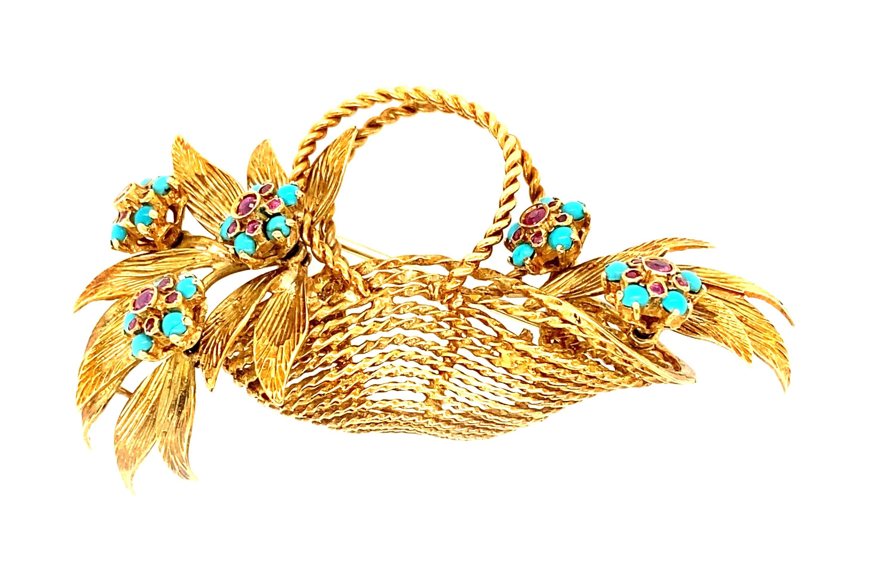 This gorgeous mid century 1960s basket brooch holds a rich grouping of turquoise and ruby flowers spilling out of each side of the basket as if they were just gathered from the garden to place into a vase. Each flower consists of one ruby to make up