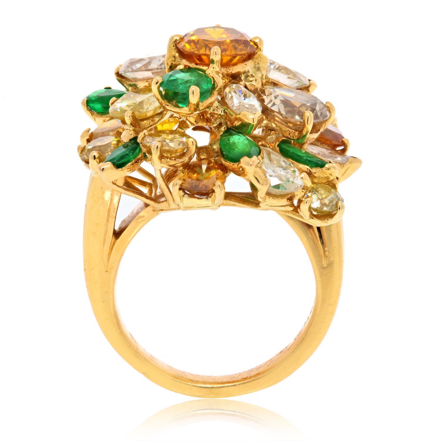 18K Yellow Gold Tutti Frutti Diamond And Color Stones Ring. Fun ring with a vintage touch encrusted with white diamonds, green emeralds of various sizes and pink sapphires. Wear this ring to a party or make your every day ring. 
Diamond Weight:
