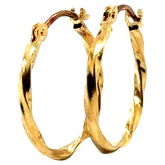 Boucles d'oreilles torsadées en or jaune 18K