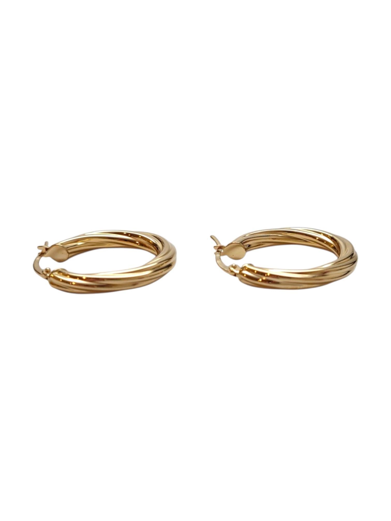 Orecchini a cerchio ovali ritorti in oro giallo 18K #21662 in vendita 1