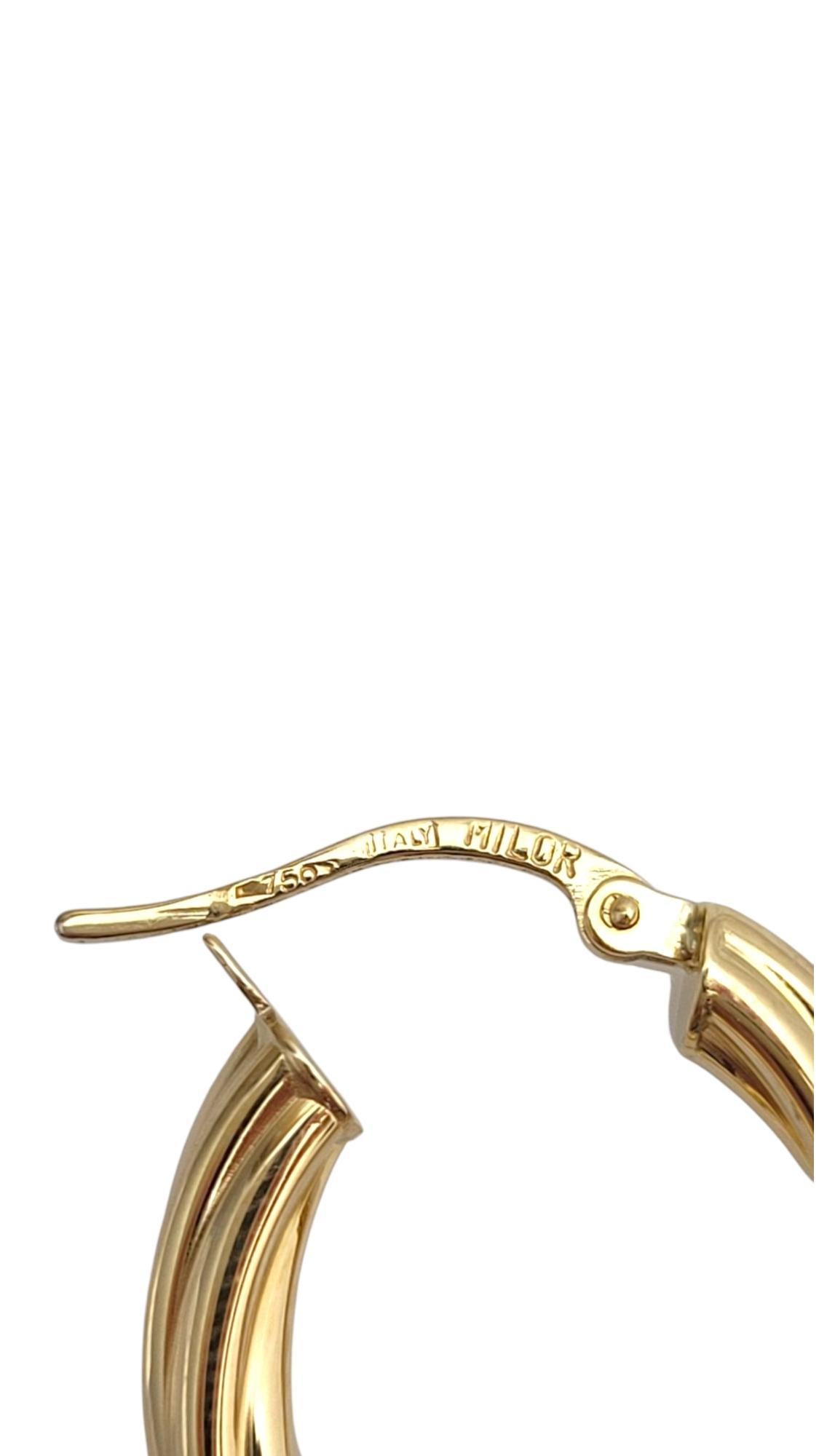 Orecchini a cerchio ovali ritorti in oro giallo 18K #21662 in vendita 3