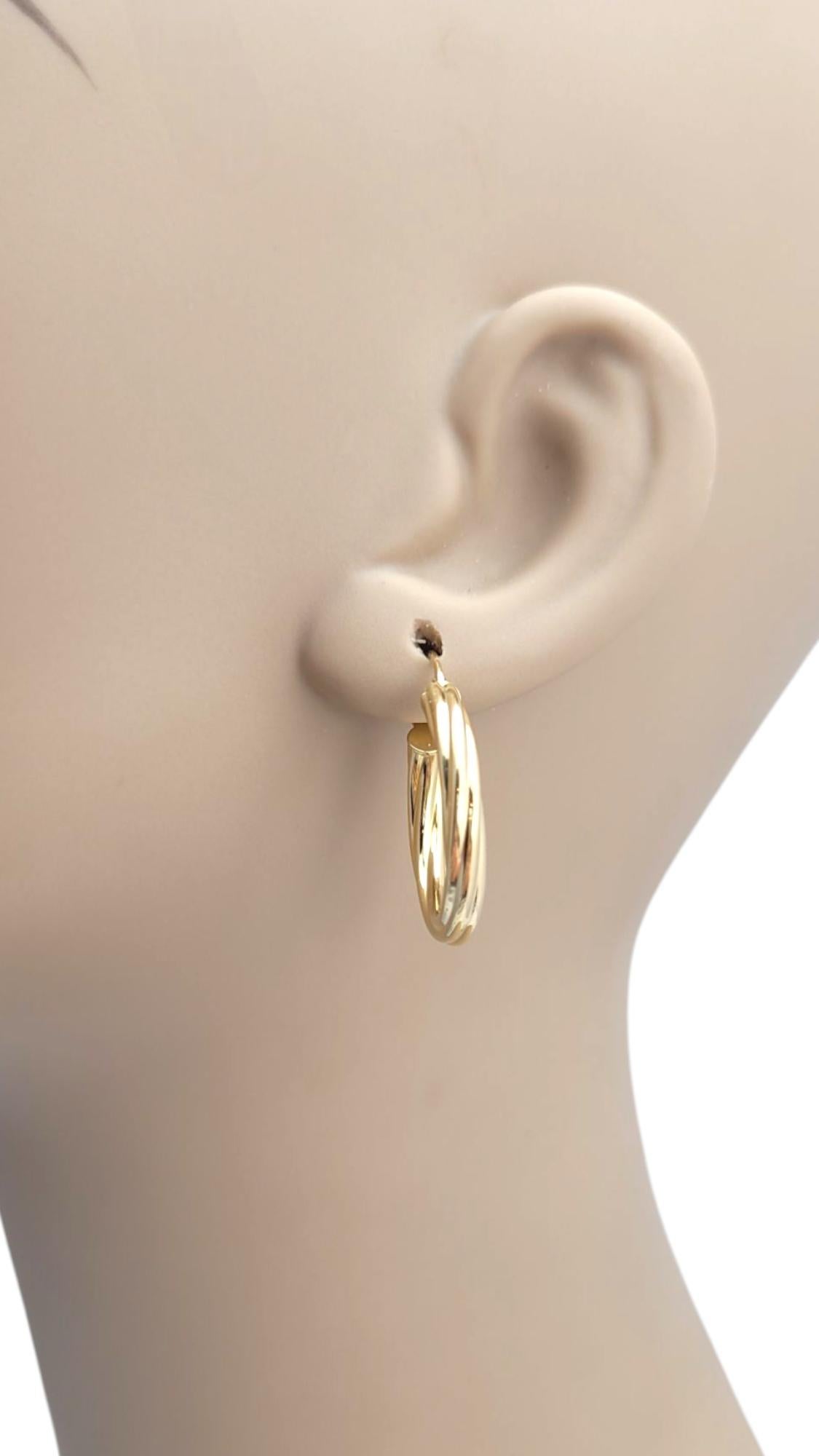 Orecchini a cerchio ovali ritorti in oro giallo 18K #21662 in vendita 5