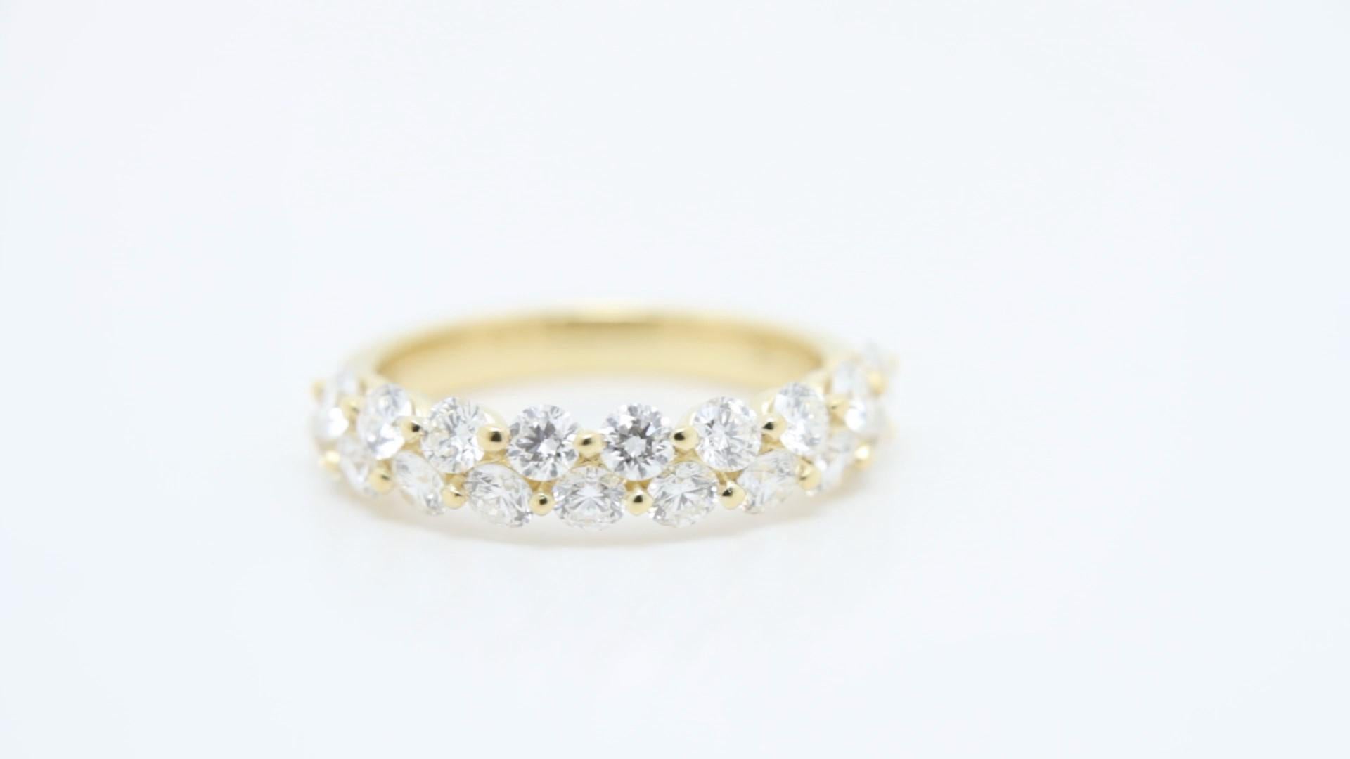 18K Yellow Gold Diamond Ring – Two-Row Domed Round Diamond Half-Way Band

Crafted in luxurious 18K yellow gold, this exquisite wedding band features a sophisticated domed profile adorned with two sparkling rows of round brilliant-cut diamonds. Set