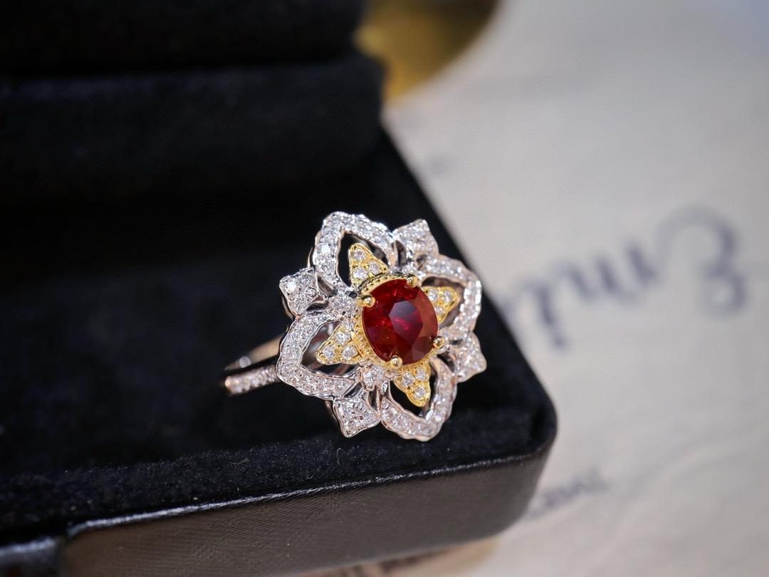 Unheated Pigeon Blood Ruby Diamond Cocktail Ring

Main stone - 0.69 CT
Diamonds - 0.3 CT 
Total Weight - 3.30 GM

Superior Material: Made of 18K gold, offering durability and a luxurious shine.
Precious Ruby: Showcases an unheated pigeon blood ruby