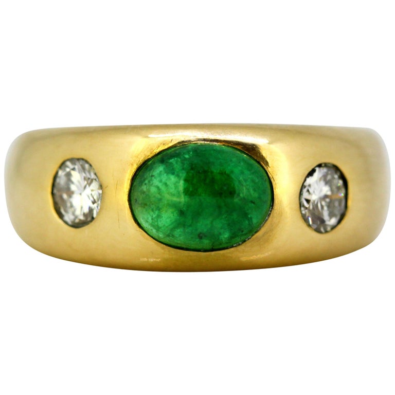 18k yellow gold unisex ring with an emerald of 1 carat and diamonds ...