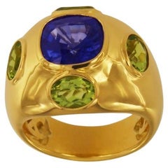 Bague unisexe en or jaune 18 carats avec saphirs et péridots