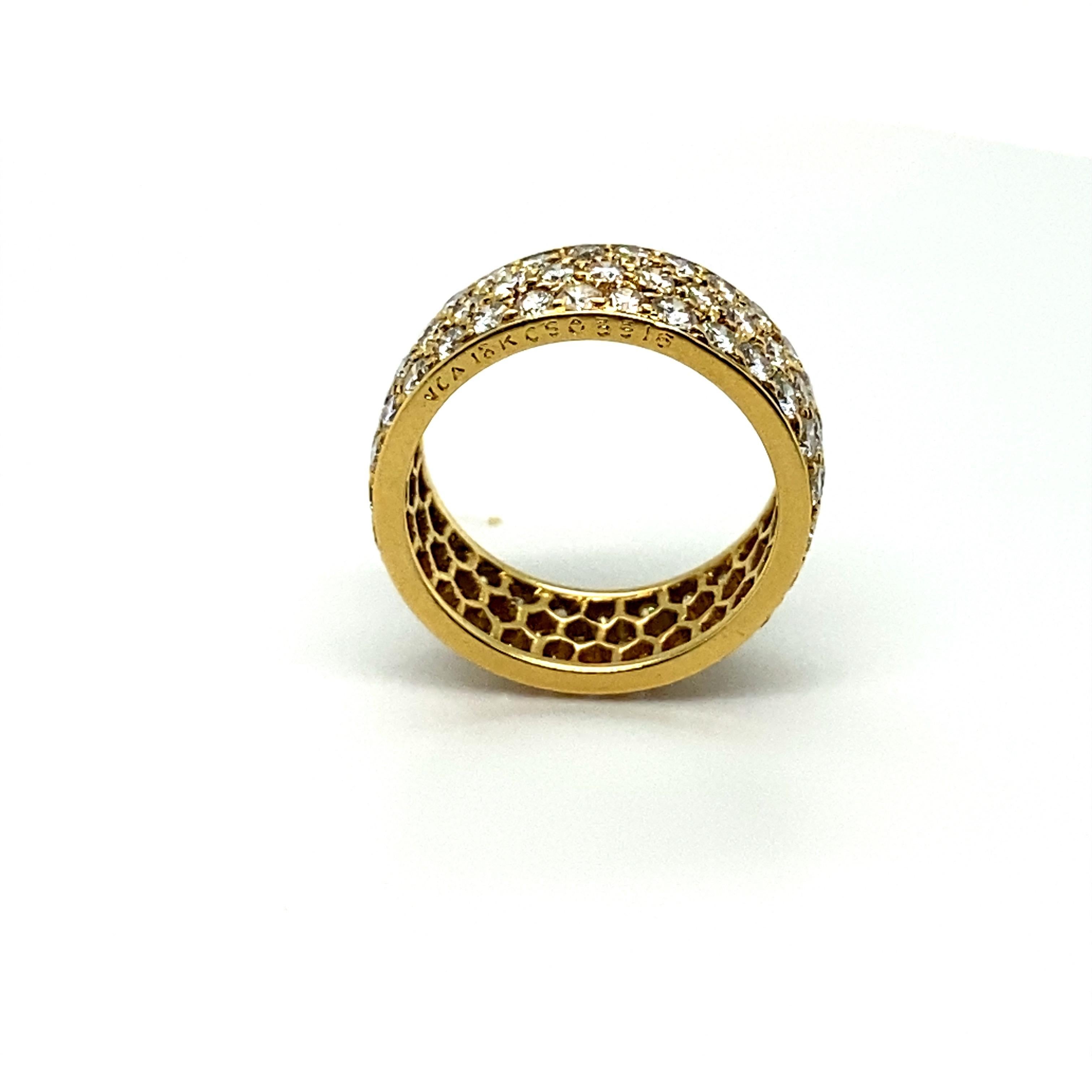 This Van Cleef & Arpels ring features approximately 4 carats of round brilliant diamonds set in 18K yellow gold. Article No. CS05516. Size 6.5. 