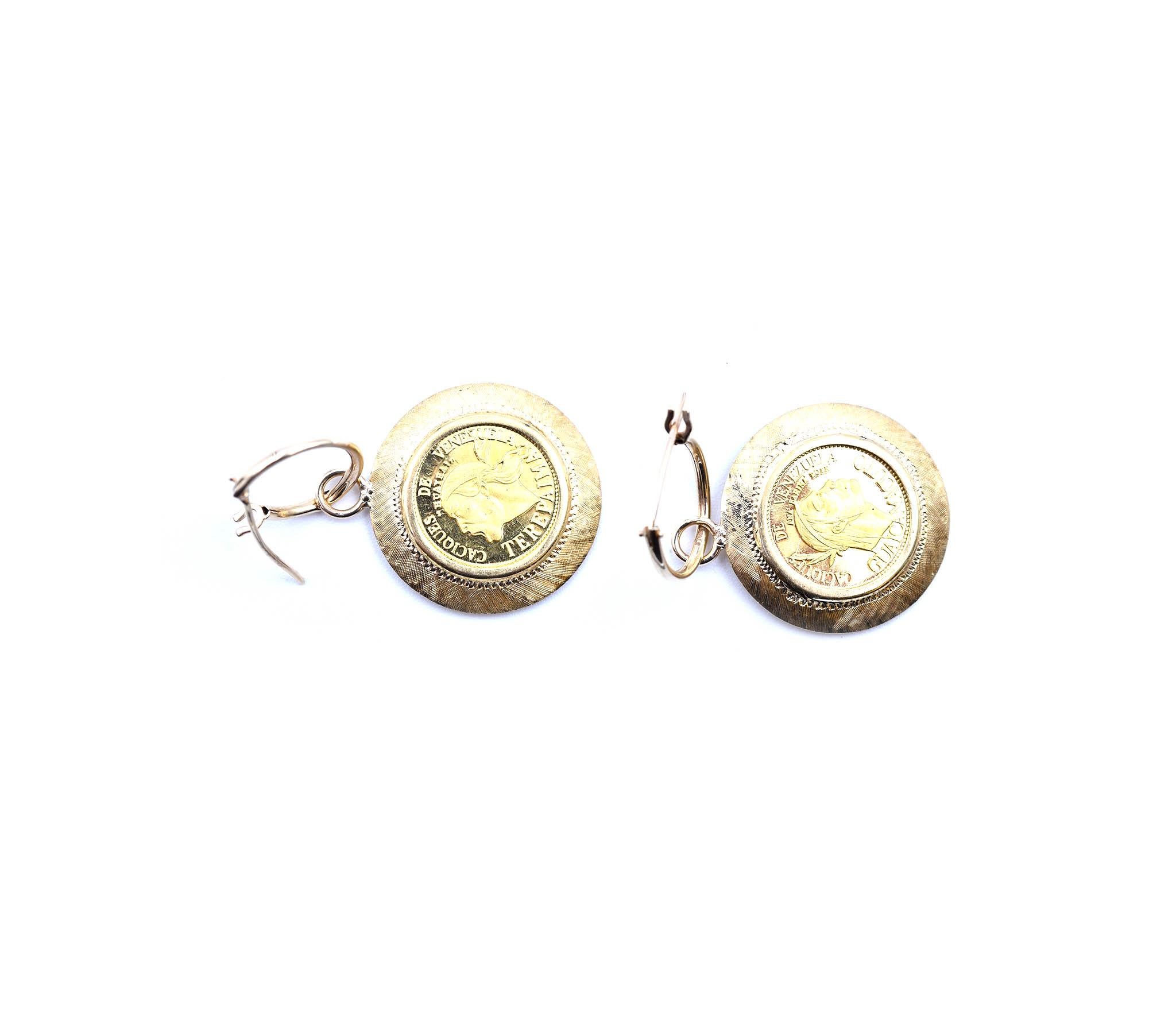 Designer: custom design
Material: 18k yellow gold and 14k yellow gold 
Dimensions: earring measure 35.20mm in length and have a diameter of 20mm
Fastenings: huggie style
Weight: 6.40 grams