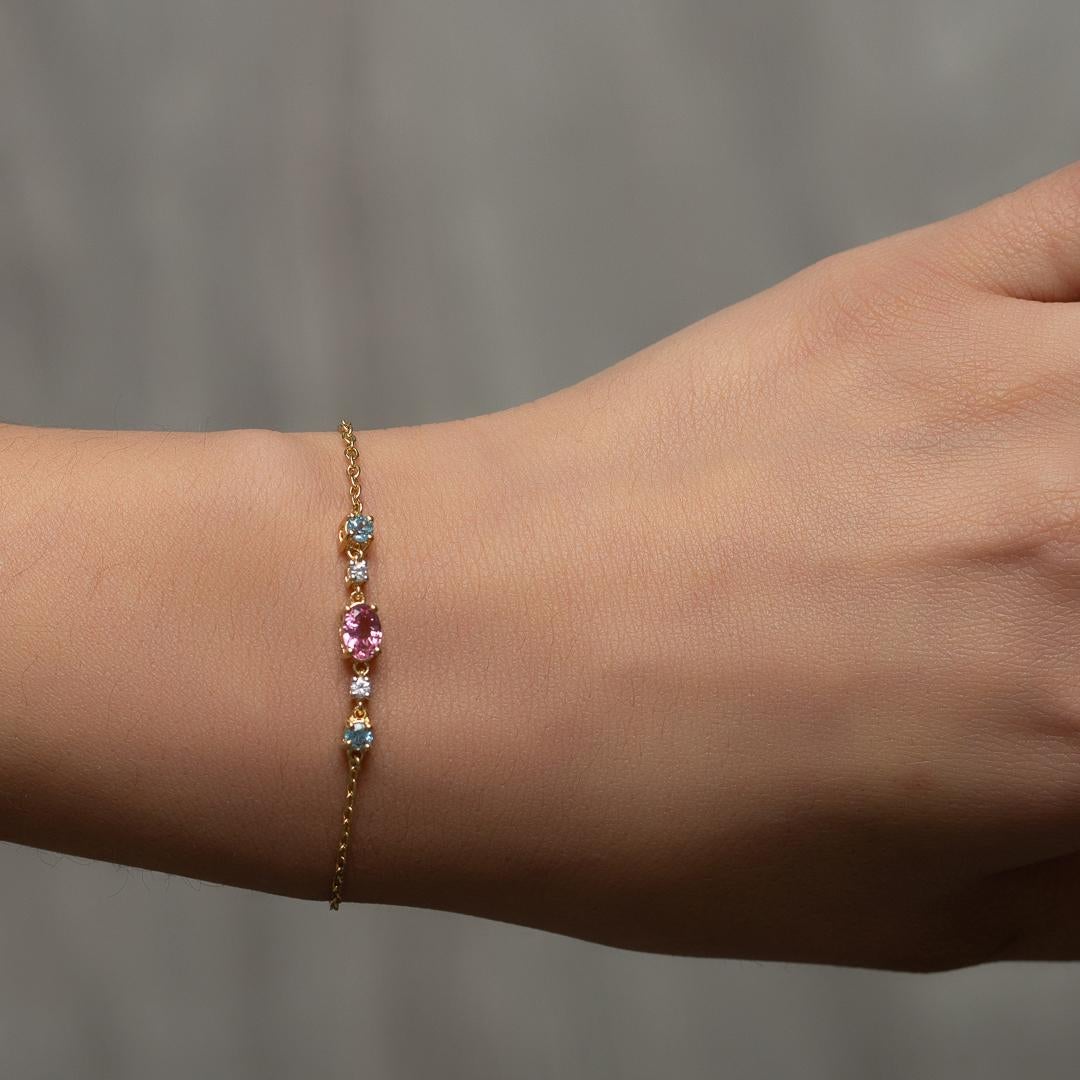 This pastel pink and pastel blue gemstone bracelet evokes femininity. A simple design made from a mixture of round and oval cut gemstones. Playful, fun, but still a standout. Wear it alone, or as the final piece to stackable bracelets. Bracelet