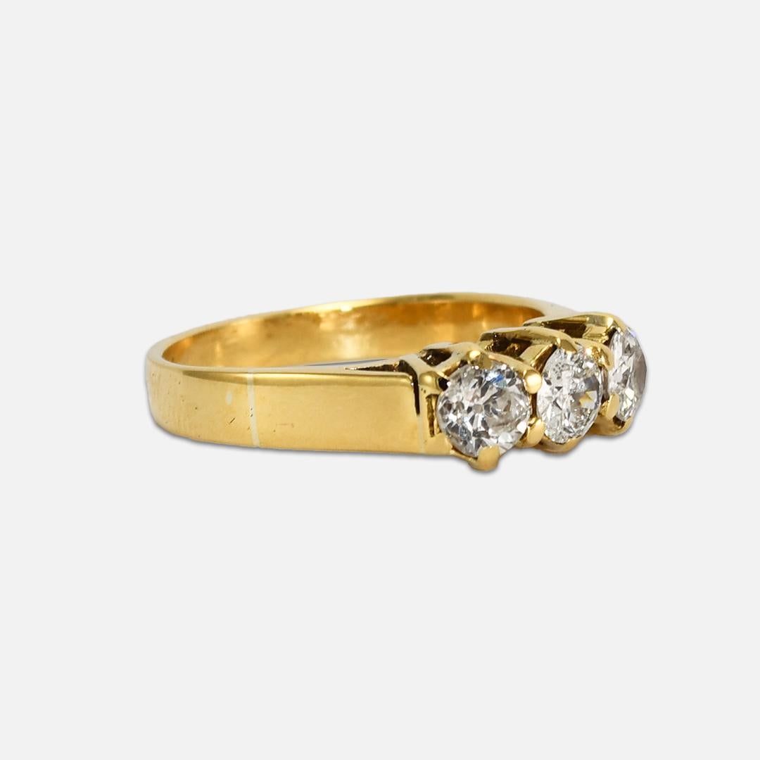 Ladies' vintage diamond cocktail ring in 18k yellow gold mounting.
The ring weighs 4.5 grams and tests 76% gold with an XRF metals analyzer.
The diamonds are old-Euro cuts, .83 total carats, j to k color, i1 to i2 clarity.
One diamond has a couple