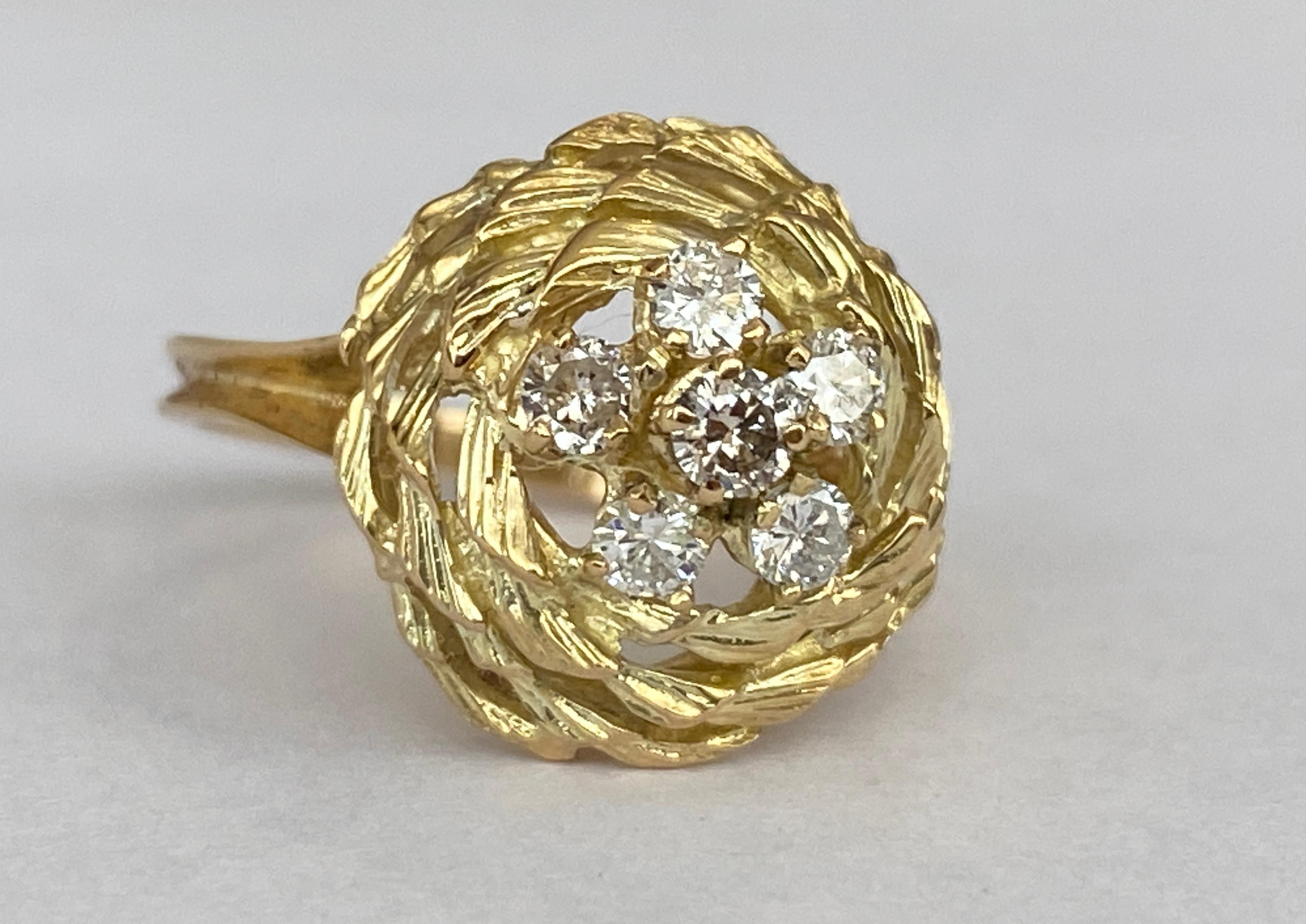 Elegant and timeless vintage 18K yellow gold domed ring is beautifully set with 6 sparkling diamonds, creating a luxurious and radiant look. The domed design adds depth and sophistication, making it a statement piece that exudes classic elegance.