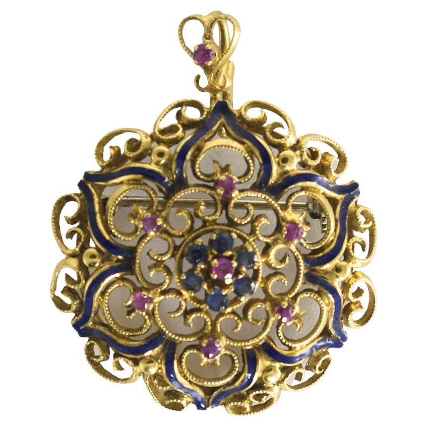 Broche vintage de oro amarillo de 18 quilates con rubí y zafiro