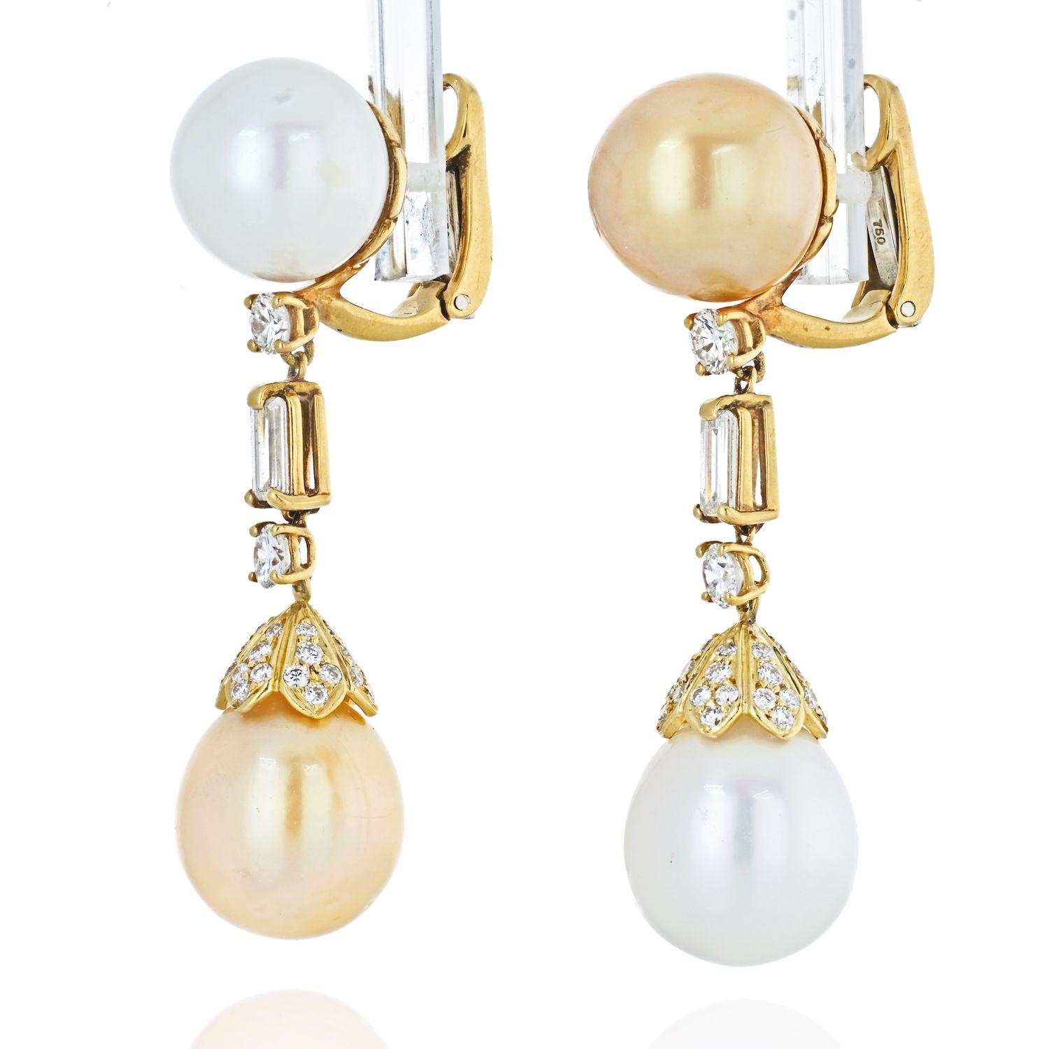 Beautiful estate 18K Yellow Gold White And Yellow Cultured Pearl Diamond Dangling Earrings. Mounted with four pearls and round brilliant and baguette cut diamonds. Approx. diamond weight 3.50cttw. Diamond quality G-H color, VS-SI clarity. 
Clip on