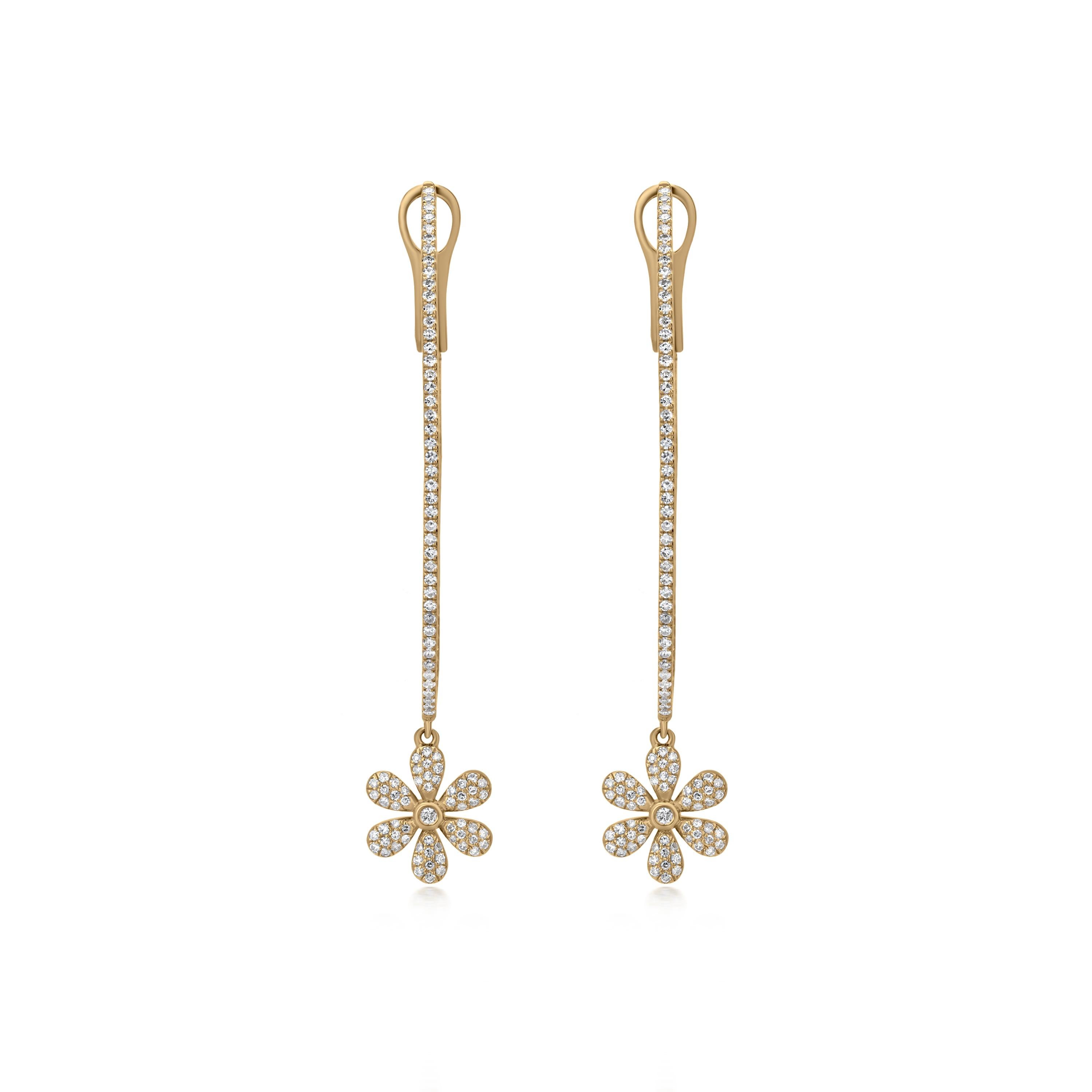 A stunning pair of 18k yellow gold hoop earrings aligned with 266 pave round diamonds adorning inside and outside, as well as a gorgeous flower motif totaling 0.77 carats of diamonds framed within pave set, it has come with omega backs. The diamonds
