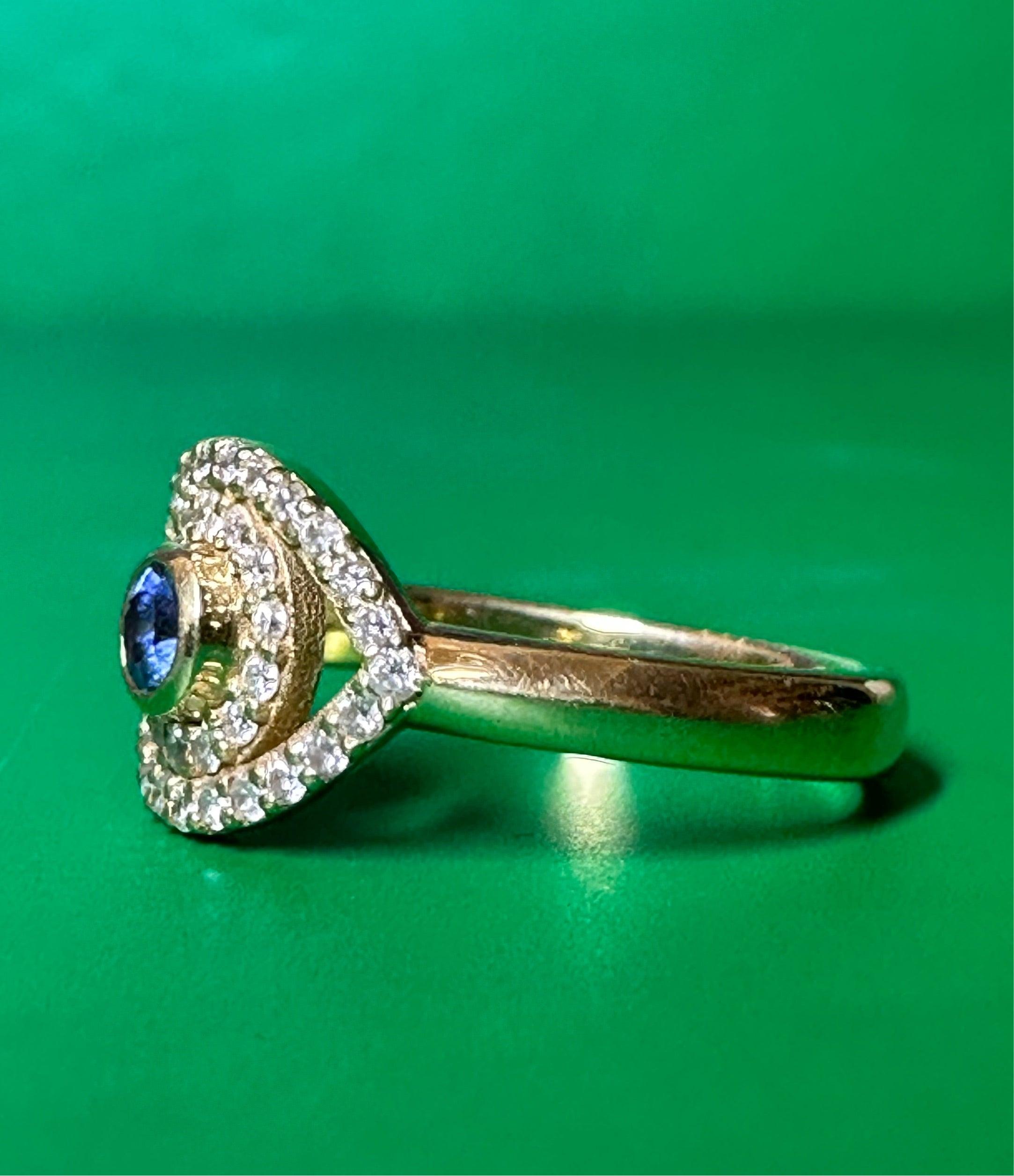 For Sale:  White Diamonds Blue Sapphire Evil Eye Ring in gold and in stock 3