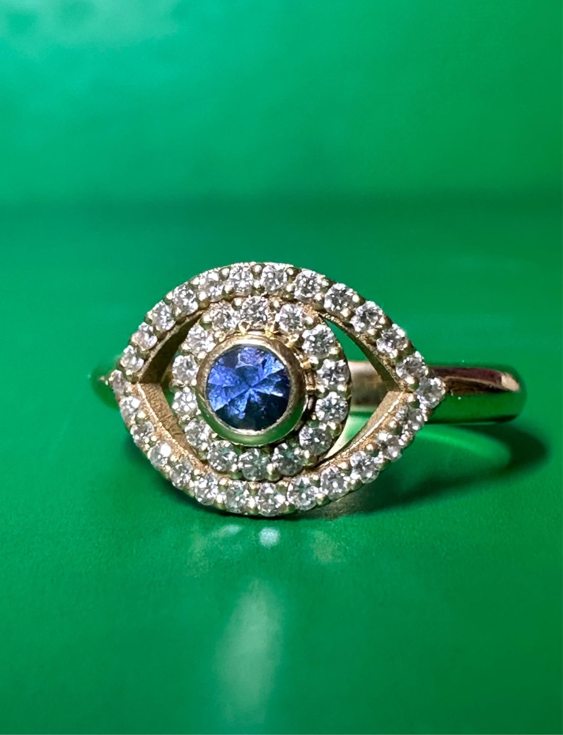For Sale:  White Diamonds Blue Sapphire Evil Eye Ring in gold and in stock 6