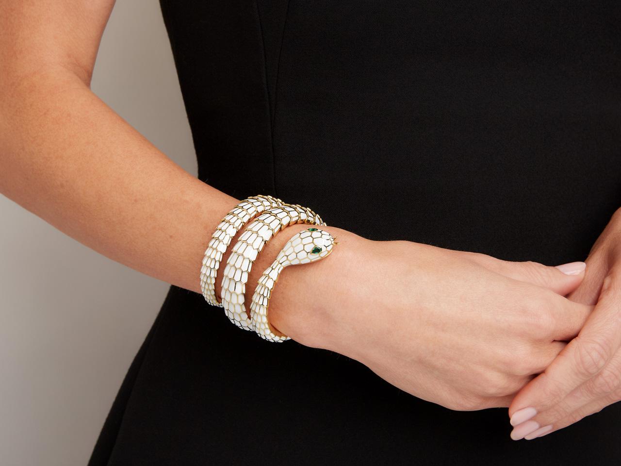 Women's 18K Yellow Gold & White Enamel Flexible Wrap Snake Bracelet with Emerald Eyes For Sale