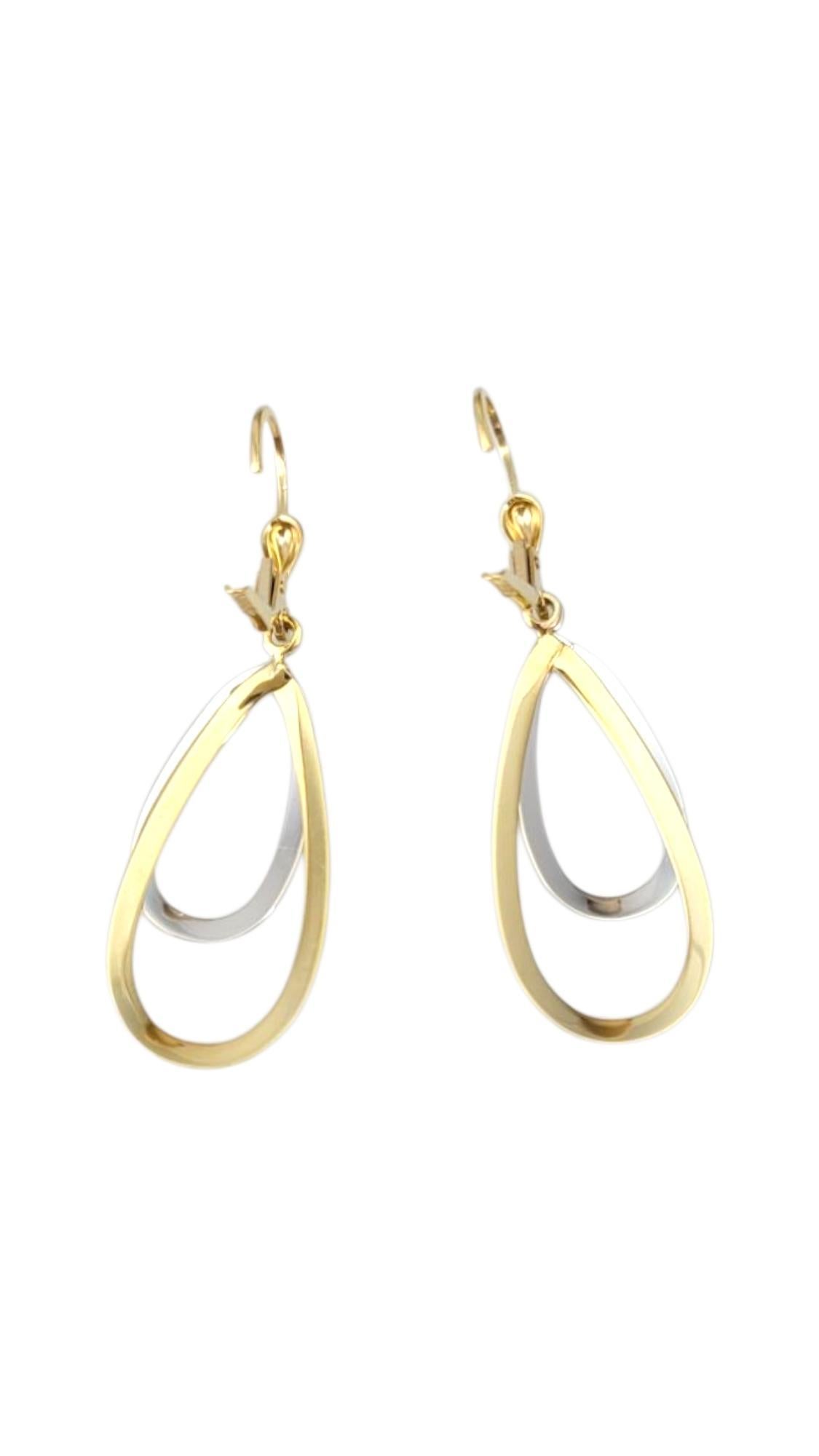 18K Yellow Gold & White Gold Dangle Earrings -

These yellow and white gold dangle earrings showcase a stunning two-tone design that blends warmth and brilliance with effortless elegance. Their graceful movement and contrasting metals create a