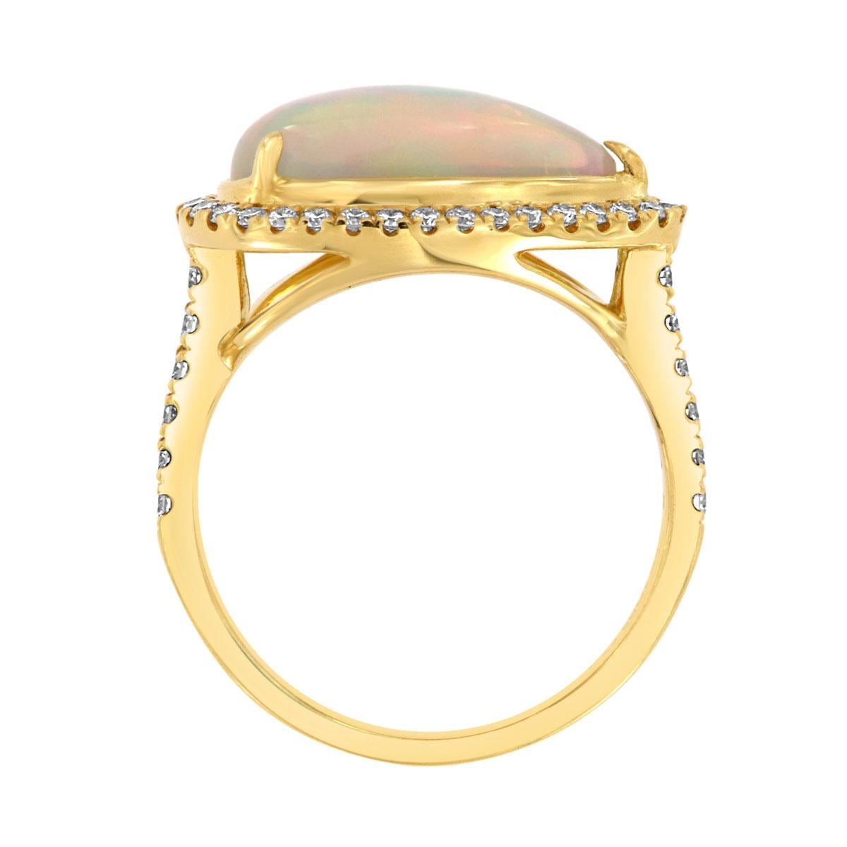 This colorful opal and diamond ring features an oval opal framed by Micro prong round brilliant diamonds in 18k yellow gold. Experience the Difference!

Product details: 

Center Gemstone Type: Opal
Center Gemstone Carat Weight: 2.57
Center Gemstone