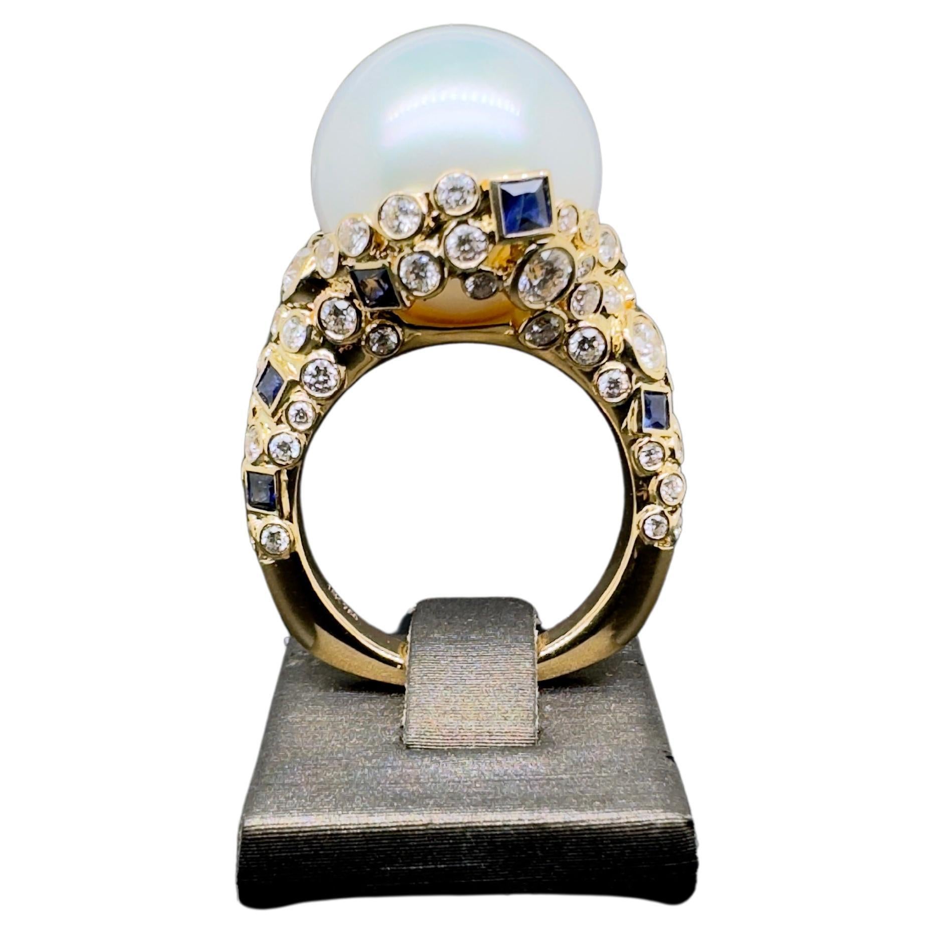 Contemporary 18k Yellow Gold White South Sea Pearl Ring with Diamonds and Blue Sapphire For Sale