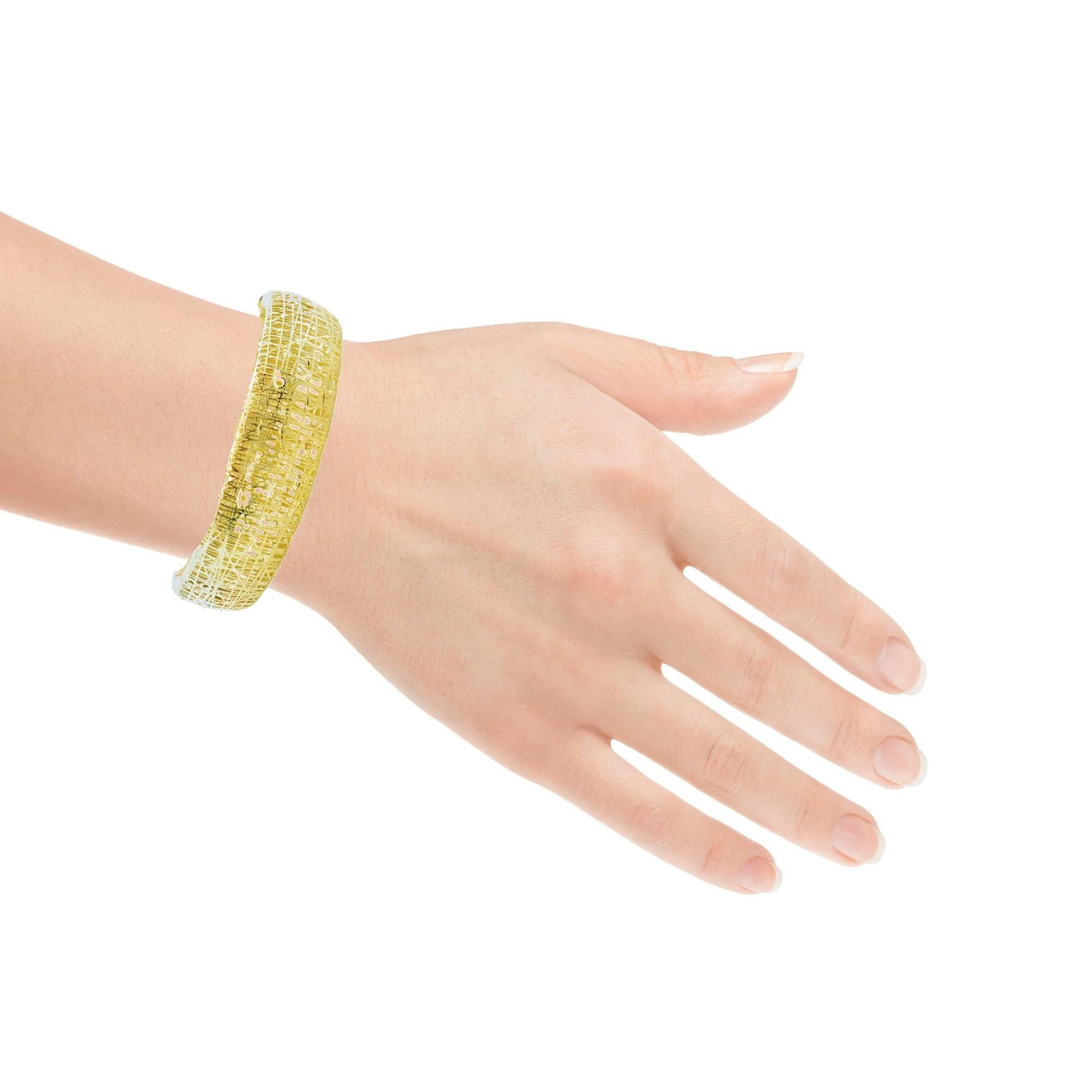 Bracelet large en or jaune 18k avec design 