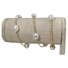 Bracelet câble en or jaune 18 carats avec perles blanches