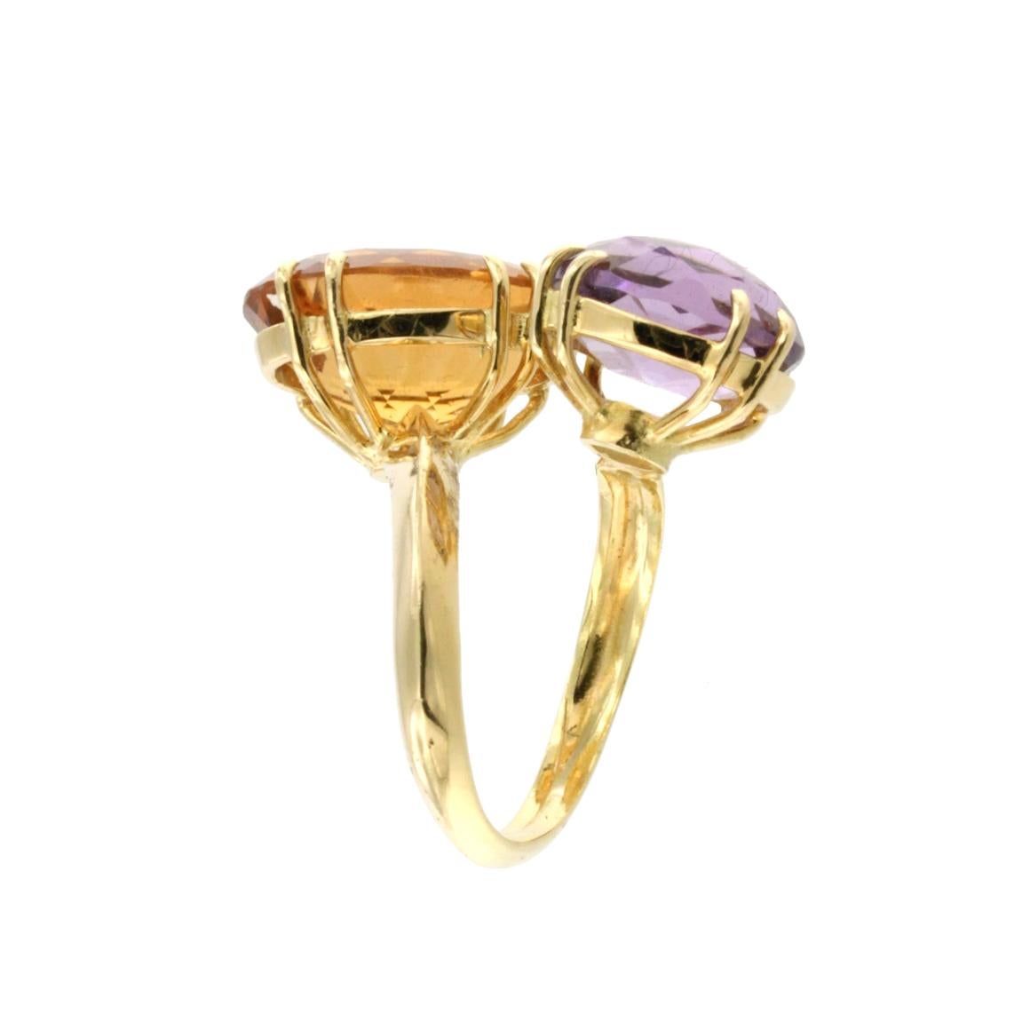  Combination of shapes and colors made a unique fashion and modern ring in 18k yellow gold with colored stones. Made in Italy by Stanoppi Jewellery since 1948.
Ring in 18k yellow gold with Amethyast (oval cut, size: 12x10 mm) and Citrine  (oval cut,