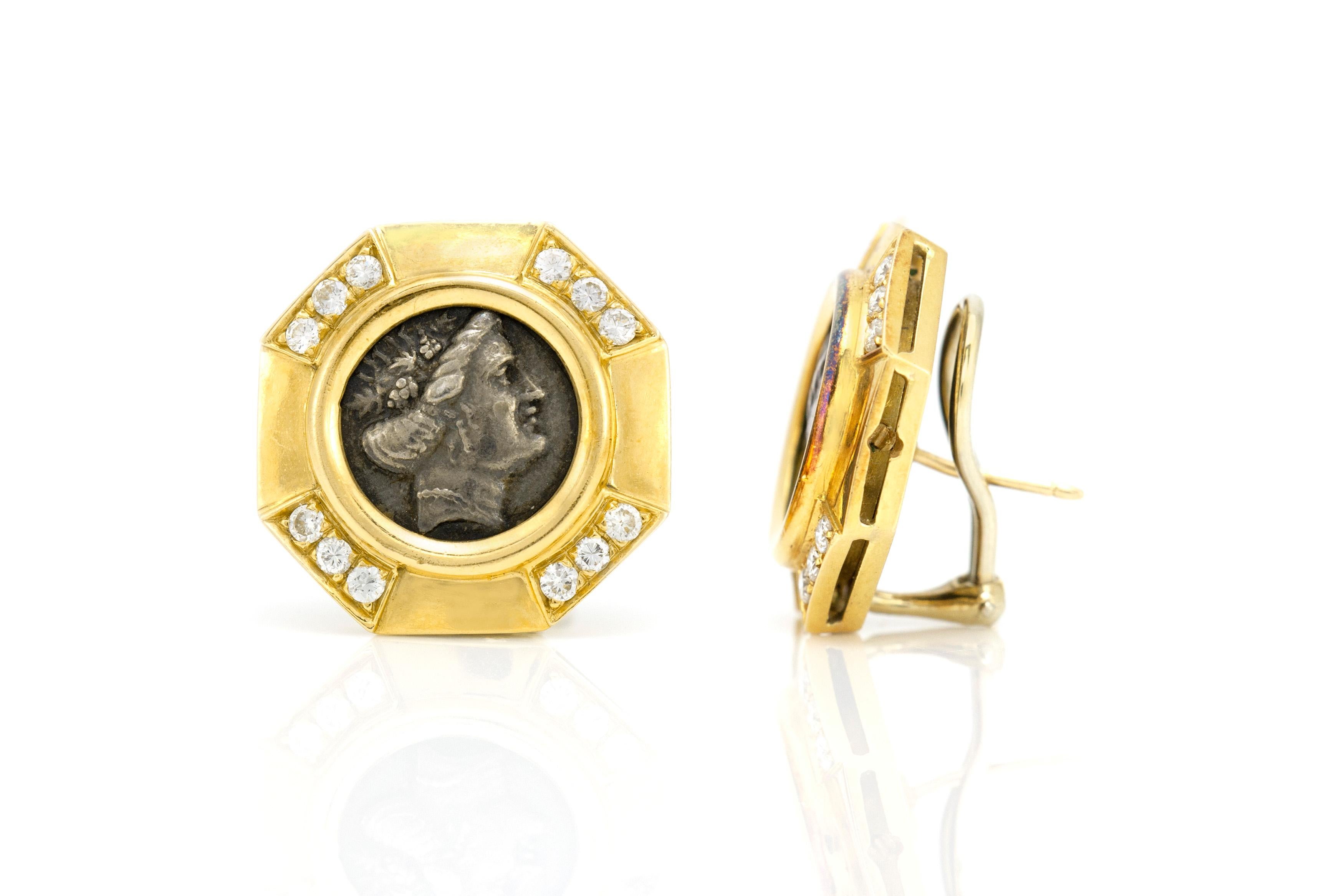 The coin earrings is finely crafted in 18k yellow gold with diamonds weighing approximately total of 1.00 carat.