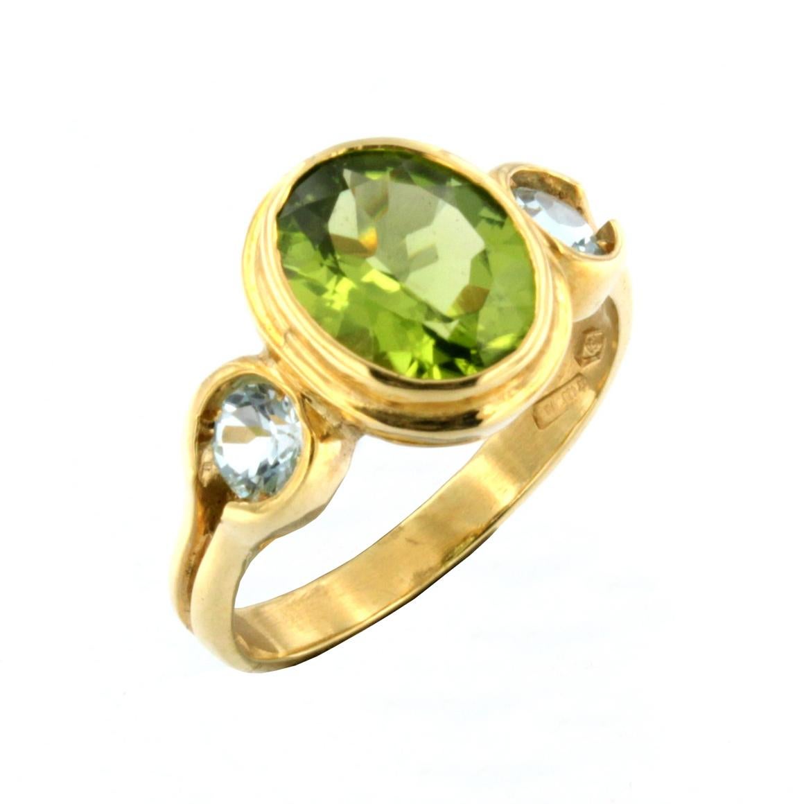 Modern 18k Yellow Gold with Peridot and Blue Topaz Ring For Sale