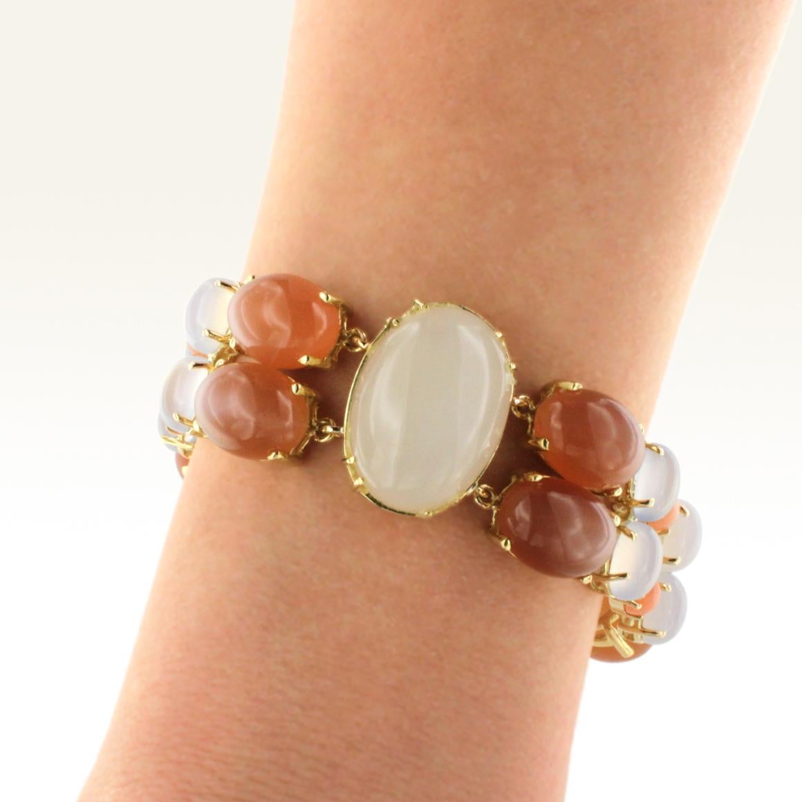 Oval Cut 18 Karat Yellow Gold with White and Peach Moonstone and Chalcedony Bracelet For Sale