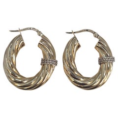 18K Yellow Gold with White Gold Accents Twisted Oval Hoop Earrings #23538
