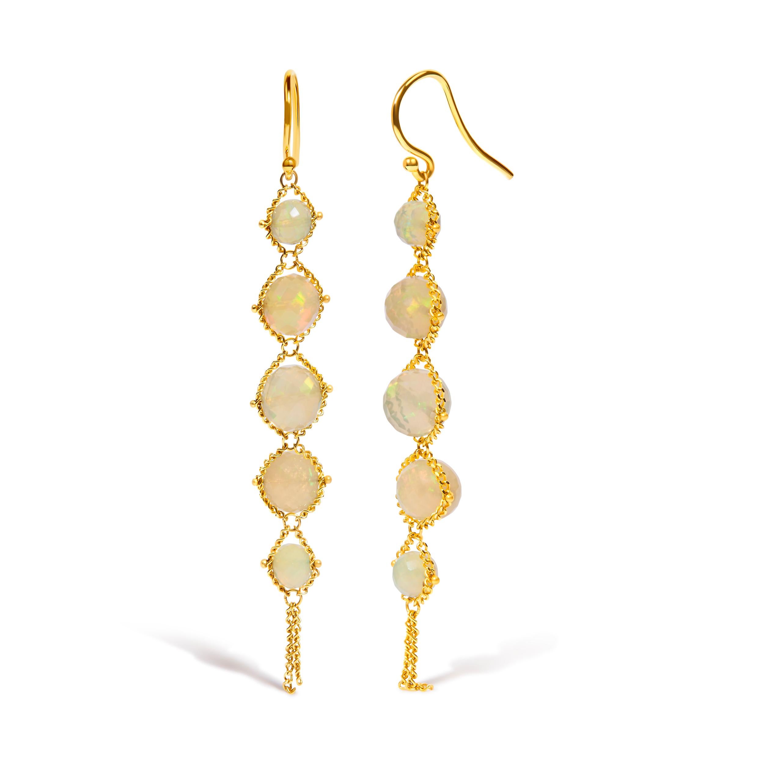 Indulge in opulent elegance with our 18K Yellow Gold Woven Egyptian Opal Drop and Dangle Earrings. Adorned with 10 mesmerizing round opals, these earrings exude a captivating charm that will elevate your style to new heights. The 2 1/2-inch drop