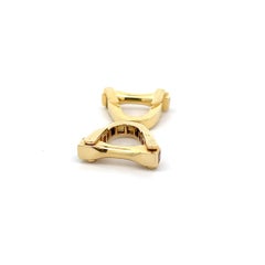 Boutons de manchette en or jaune 18k avec rubis enveloppant