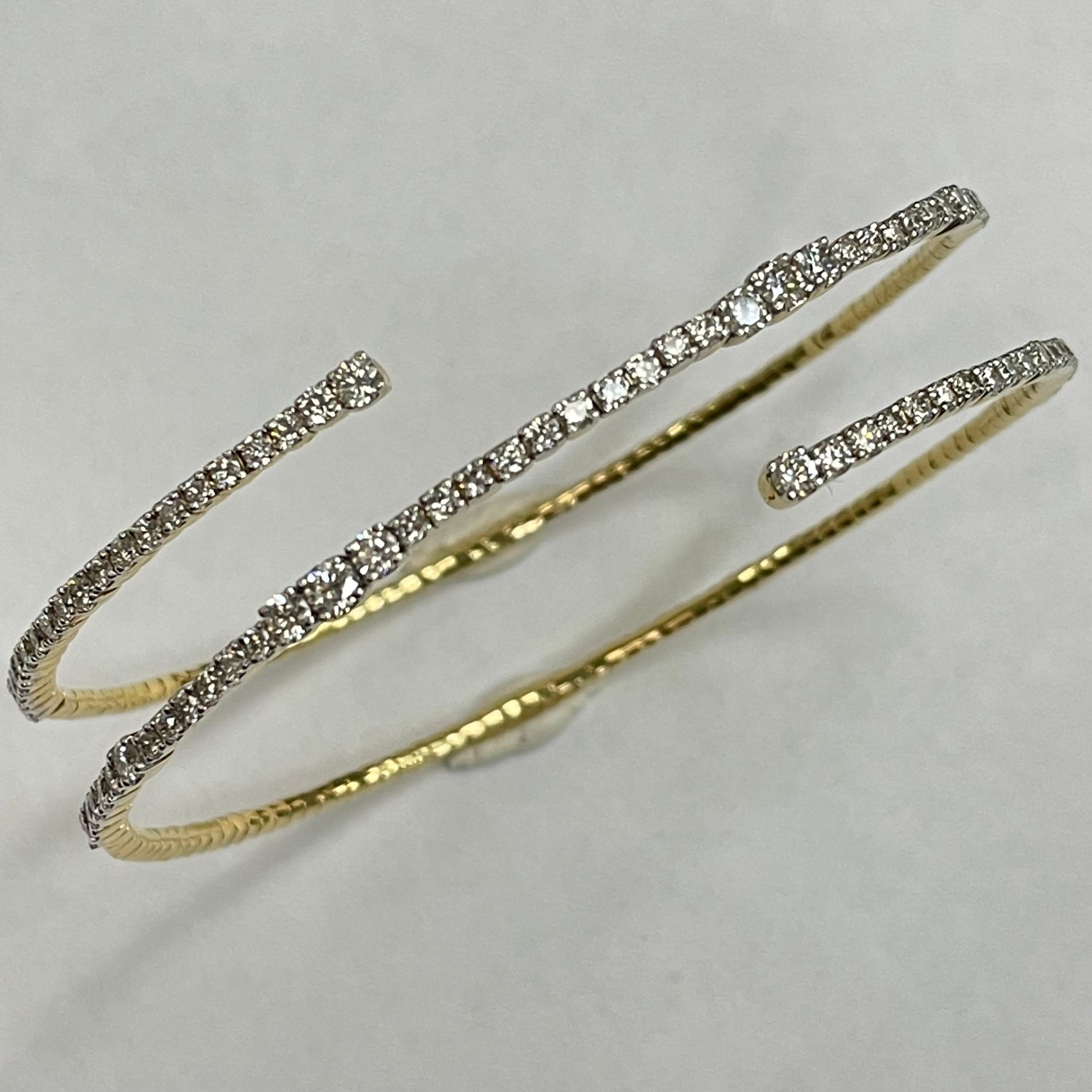 This 18K yellow gold wrap diamond open bangle bracelet set with 84 pieces brillant - cut diamonds, weighing 2.09 carats. This bangle is perfectly suited for occasions when you feel elegant, sleek, and graceful.