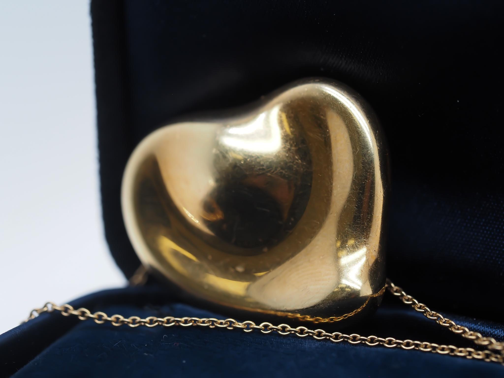 Year: 2000s

Item Details:
Metal Type: 18K Yellow Gold [Hallmarked, and Tested]
Weight: 14.1 grams

Measurement: Chain is 26 inch long, Heart is top to bottom is 1.25 inch

Condition: Excellent
