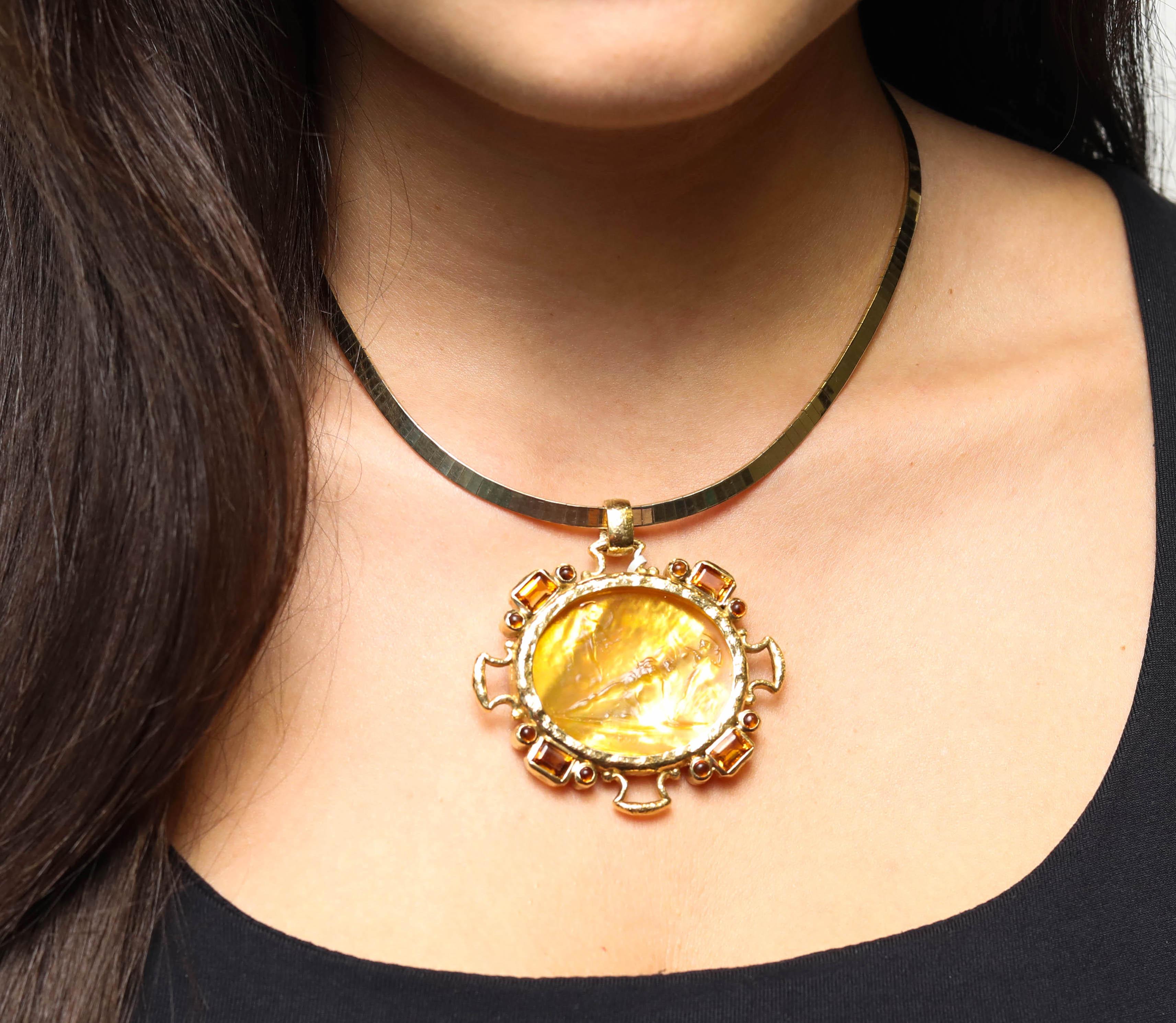New Victorian 18k Yellow Gold Yellow Italian Murano Glass Carved Intaglio Pendant

A cameo, an intaglio is created by carving below the surface to produce an image in relief, with the purpose of pressing into sealing wax. Intaglios were often used