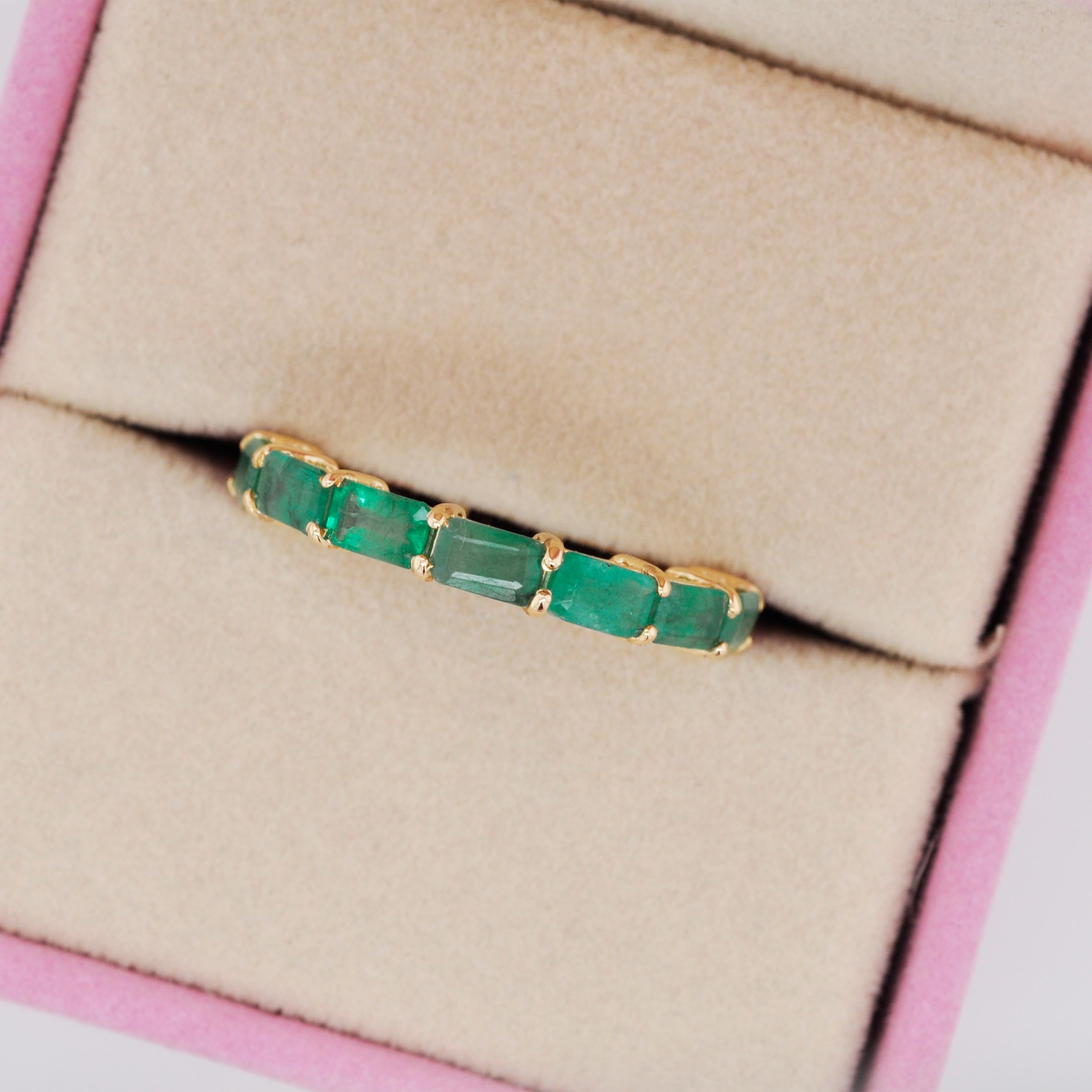 For Sale:  18K Yellow Gold Zambian Emerald Mozambique Ruby 5x3 MM Octagon Eternity Ring 7