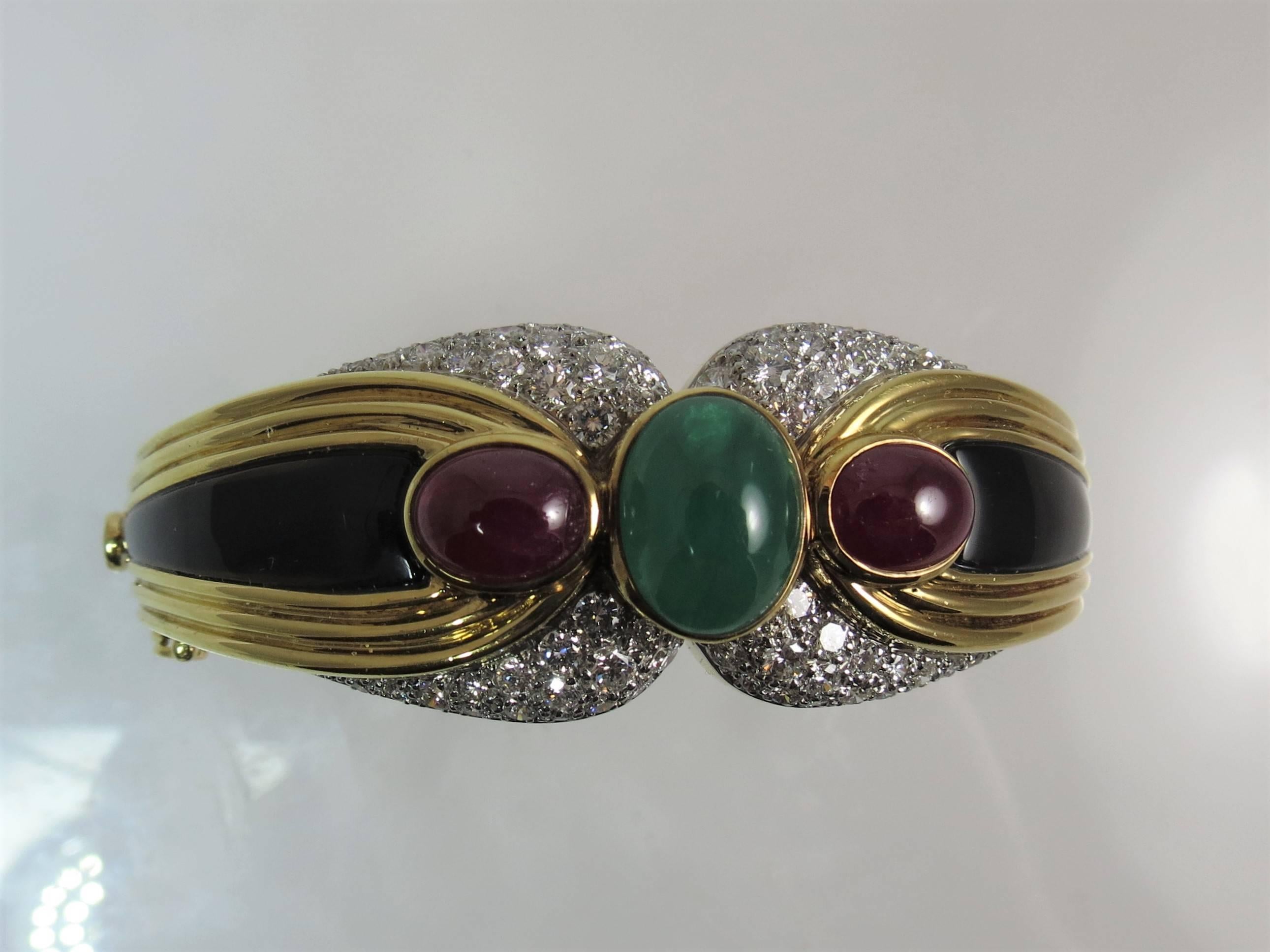 18 Karat Yellow Gold, Platinum Bracelet with Diamonds, Onyx and Ruby and Emerald In Excellent Condition For Sale In Chicago, IL