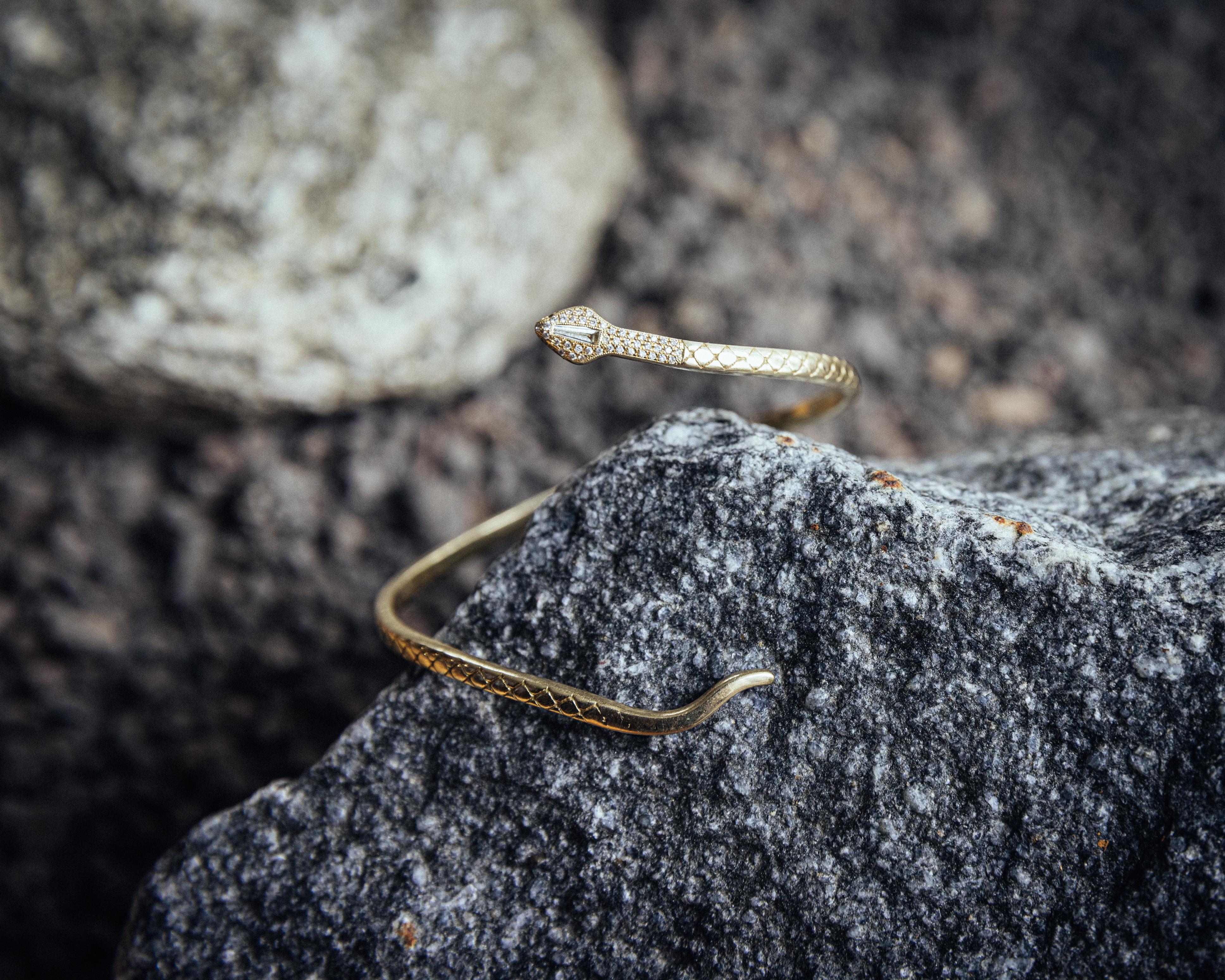 18k Yellow Snake Cuff with Hand Cut Tapered Baguette Head and Pave Diamonds. 