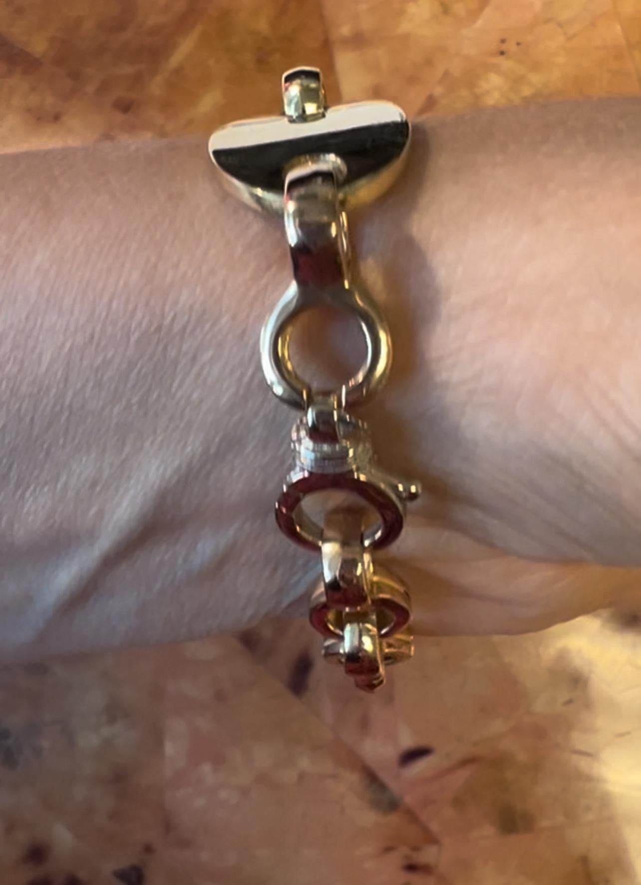 This exquisite multicolor gold bracelet is a true testament to luxurious craftsmanship and elegant design. Featuring two prominent oval ID parts, this bracelet seamlessly blends three shades of 18k gold: rich yellow, sleek white, and romantic rose.