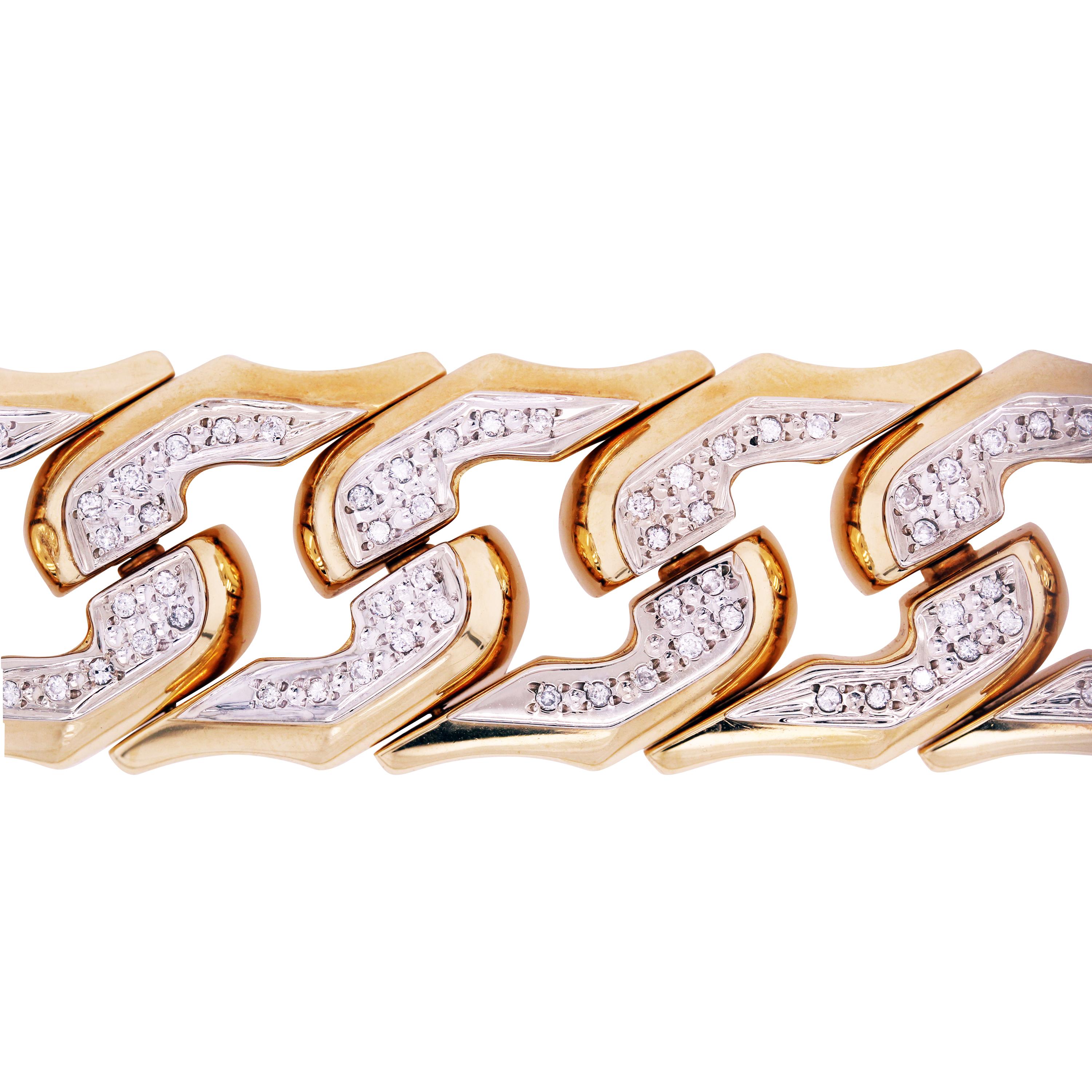 18K Yellow and White Gold Cuban Link Bracelet with Diamonds

This bracelet features 1.80 carat apprx. G color, VS clarity diamonds total weight

Bracelet weighs 83.60 grams

7.5 inches in length and 0.95 inches in width