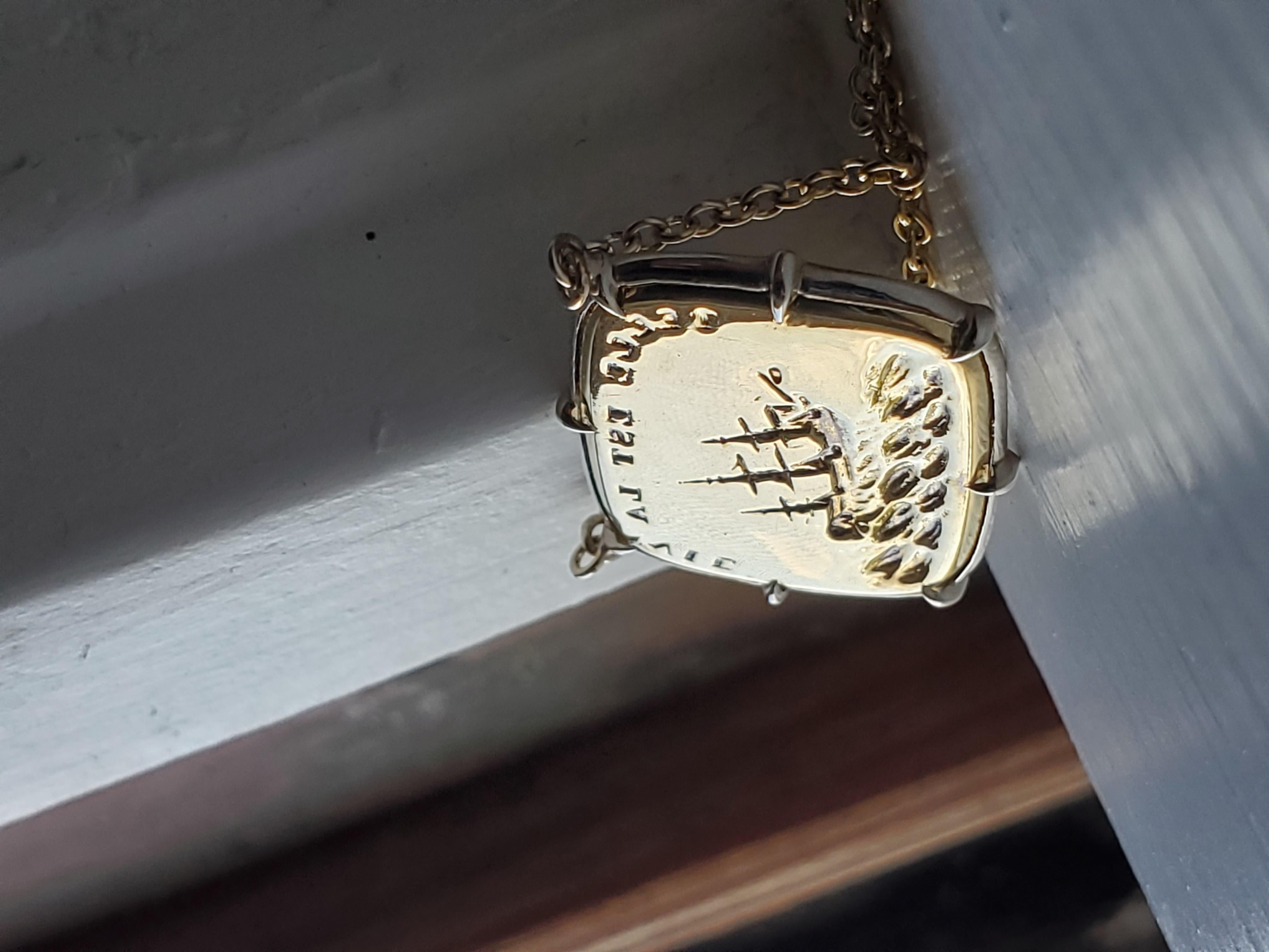 This majestic solid gold seal features a mighty three-masted sailing ship navigating rough seas, symbolizing resilience and strength. Our 