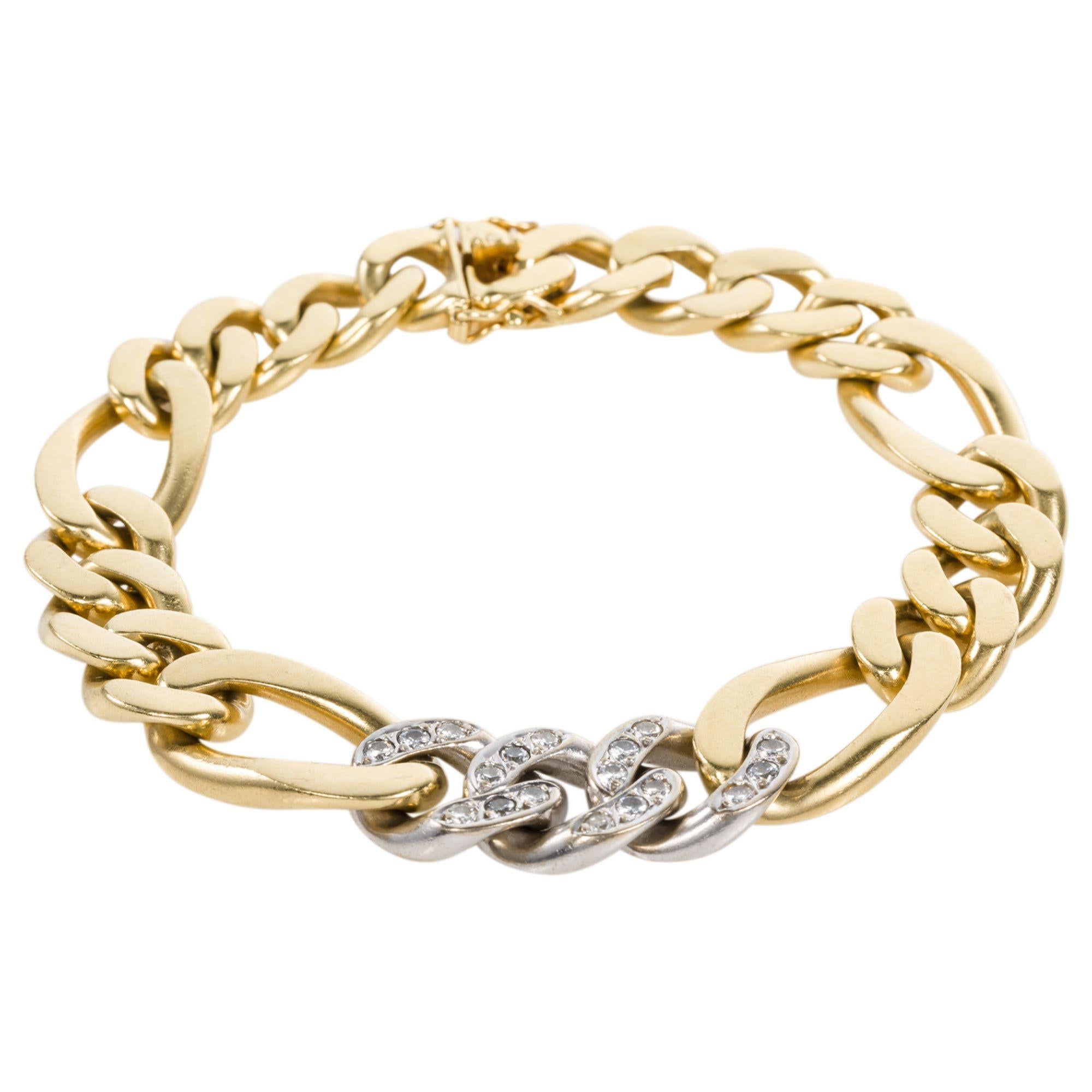 Perfect for the Ladies or Gents - this heavy & solid 18k yellow & white gold curb link bracelet is just the right piece for everyday wear. It will definitely become your signature piece - wear it alone or stack it with other bracelets and bangle.