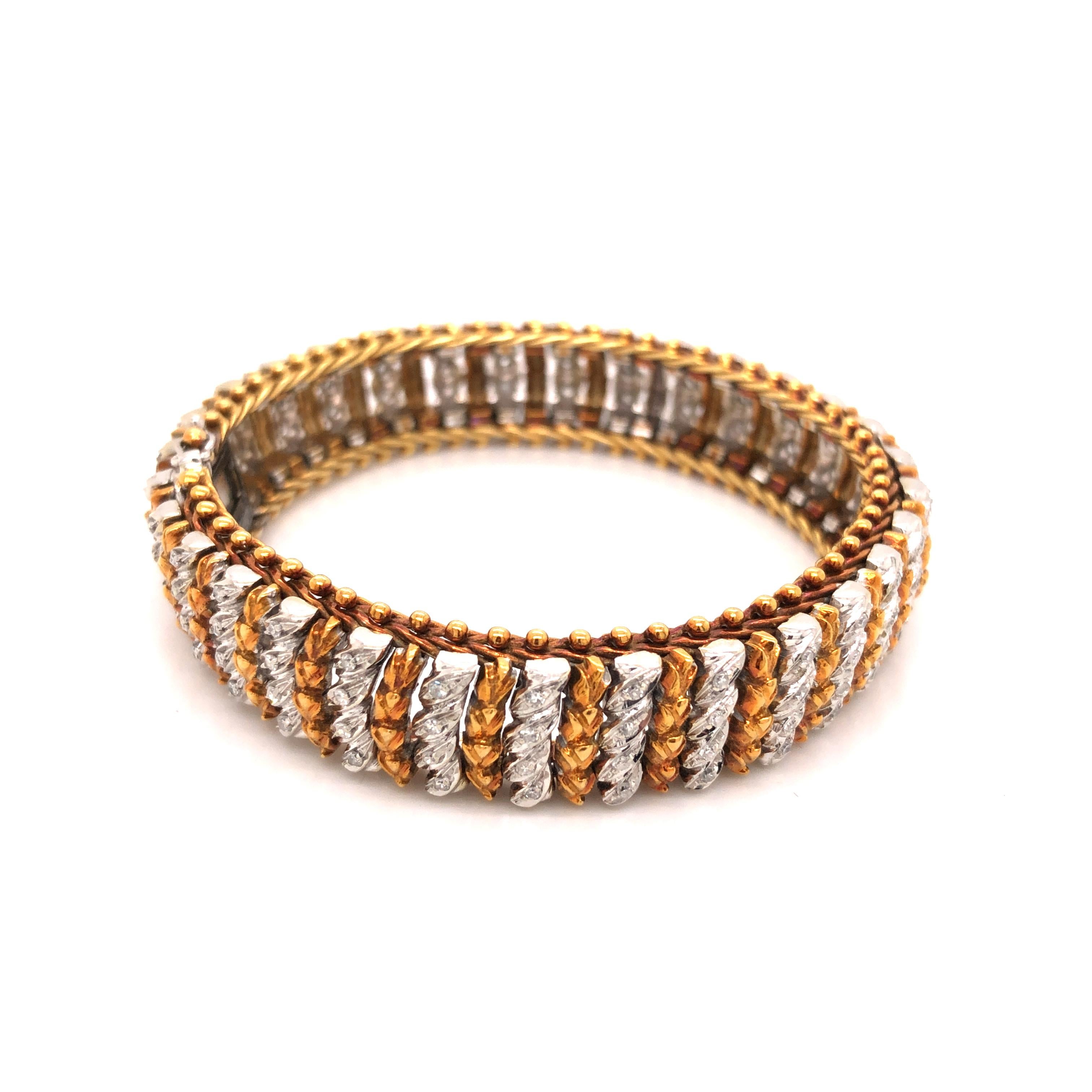 A vintage 18K two tone gold bracelet featuring single-cut diamonds weighing a total of approximately 0.60 carat, G-H-I Color, SI clarity.

Stone: Diamond ~ .60 carat

Metal: 18K White & Yellow Gold

Size: 6