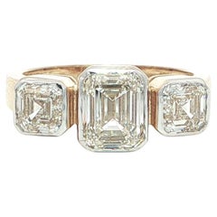 18k Yellow 
White Gold GIA 2.60ctw Emerald Cut Bezel Set Diamond 3 Stone Ring