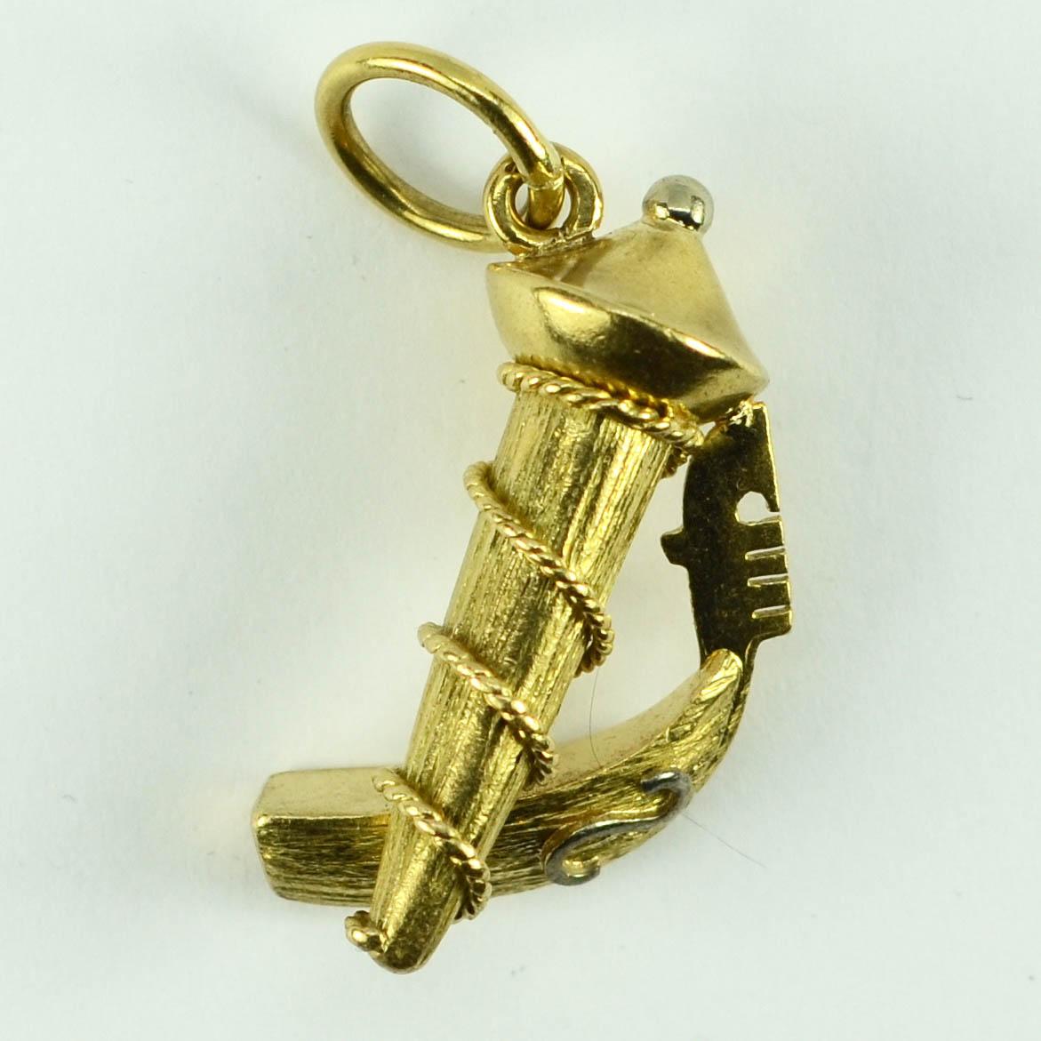 A large 18 karat (18K) yellow and white gold charm pendant designed as an Italian gondola (a canal boat in Venice) tied to a post. Unmarked but tested for 18 karat gold.

Dimensions: 3.5 x 1.5 x 1.5 cm
Weight: 5.93 grams