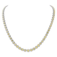 Vintage 18K yellow & white gold Riviera diamond necklace with GIA certified fancy 