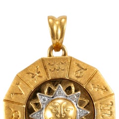 Ciondolo a medaglia in oro giallo e bianco 18 carati con motivo del sole e diamanti, con segno zodiacale girevole