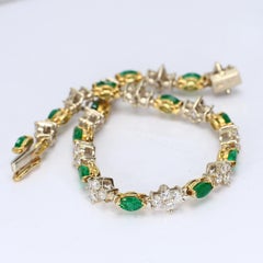 18k Yellow & White Gold Tennis Bracelet with Marquise Emeralds with Diamonds