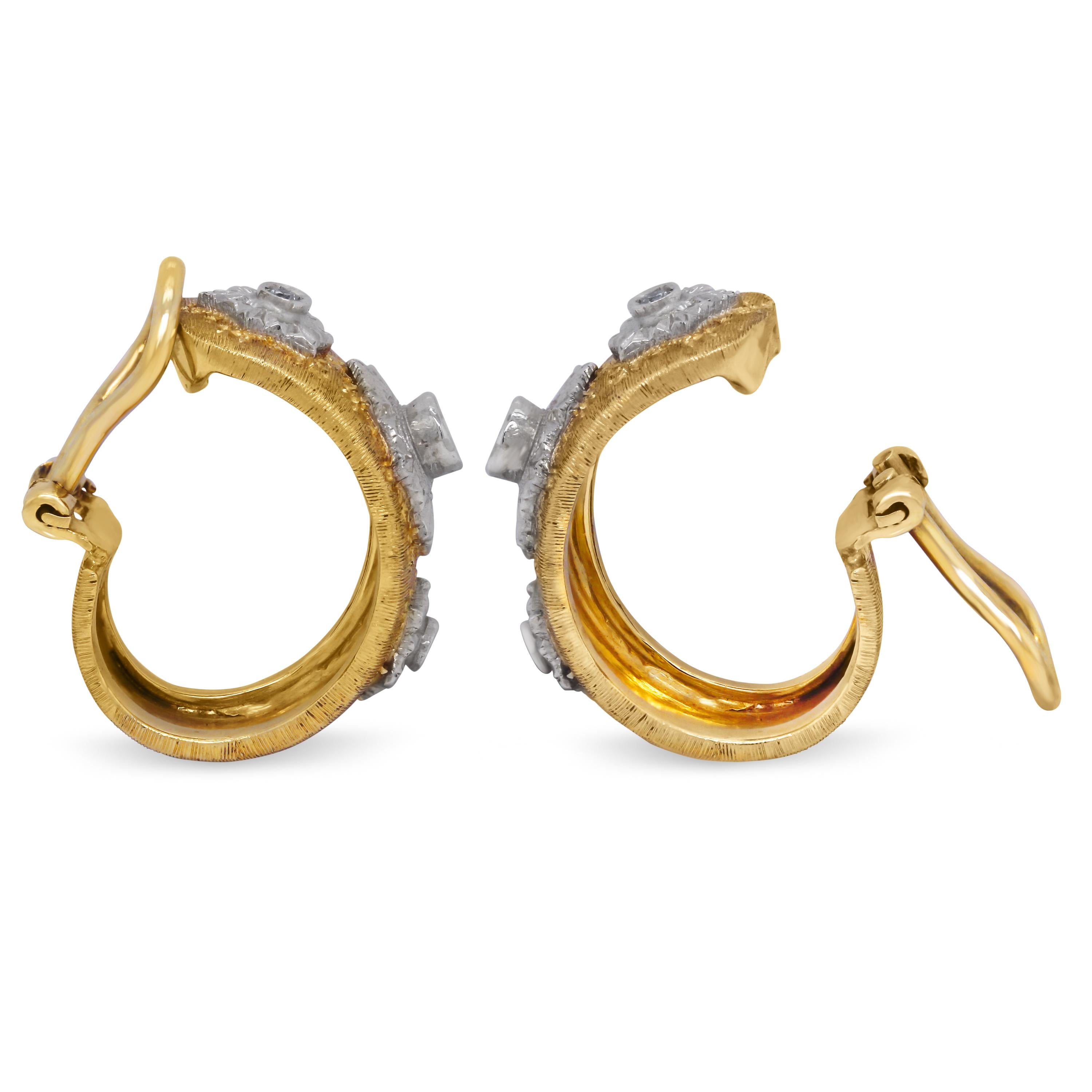 18K Yellow White Two Tone Gold Diamond Hammered Finish Hoop Earrings

These unique earrings feature a hammered gold finish with diamonds set in 18k white gold.

Earrings are 0.84 inch by 0.40 inch.

Apprx. 0.30 carat G color, VS clarity diamonds